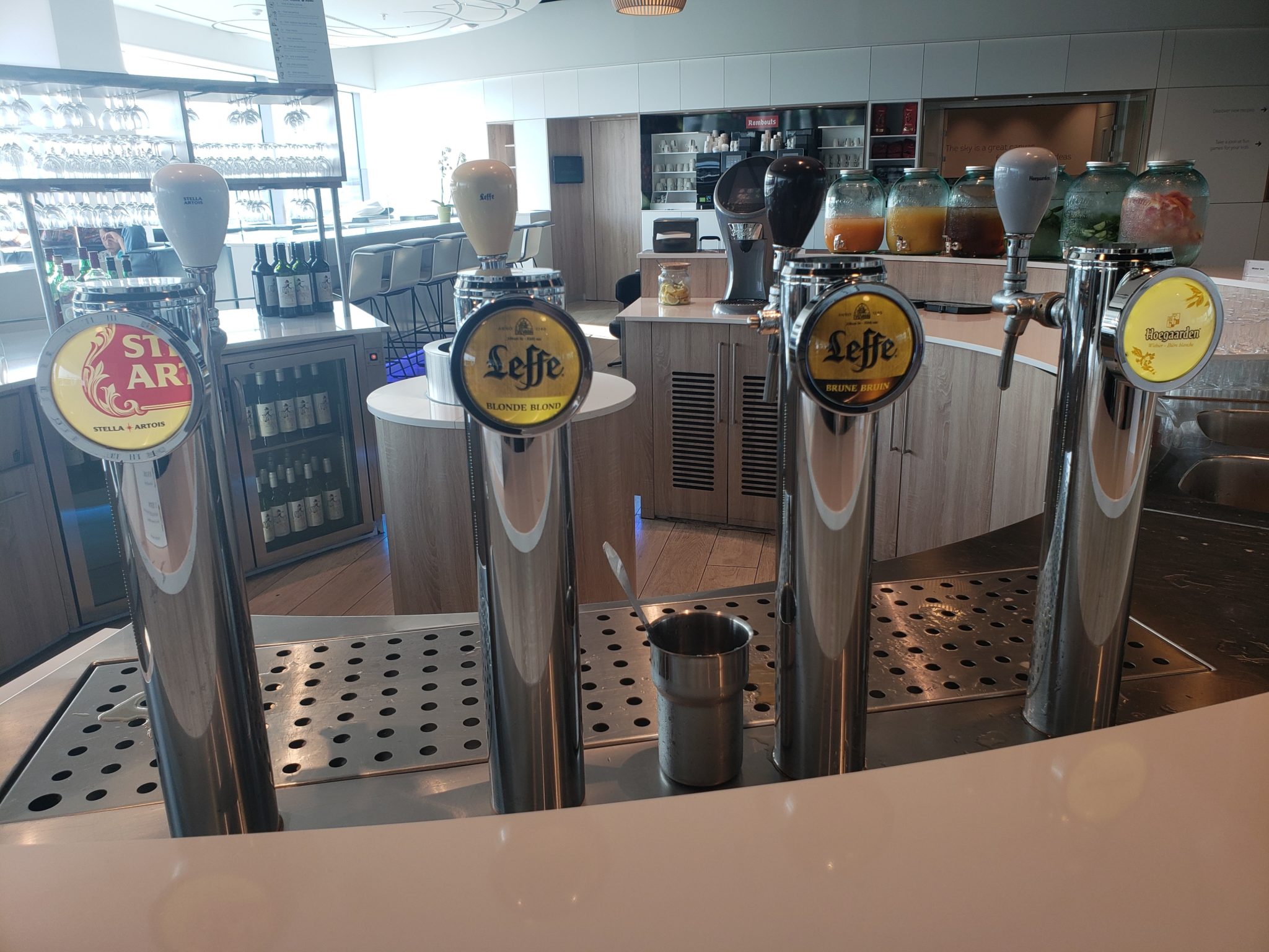 a row of beer taps