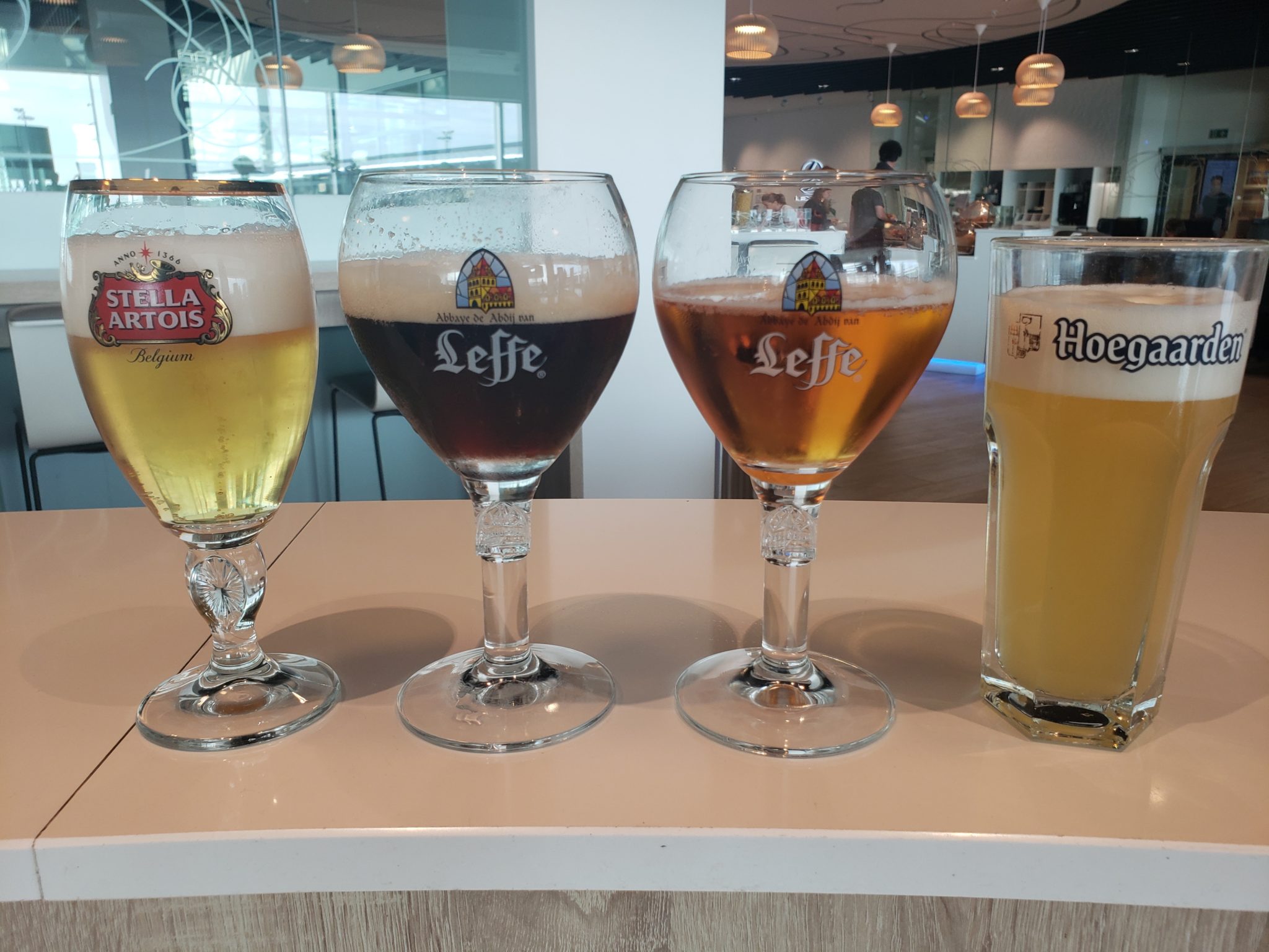 a row of glasses of beer