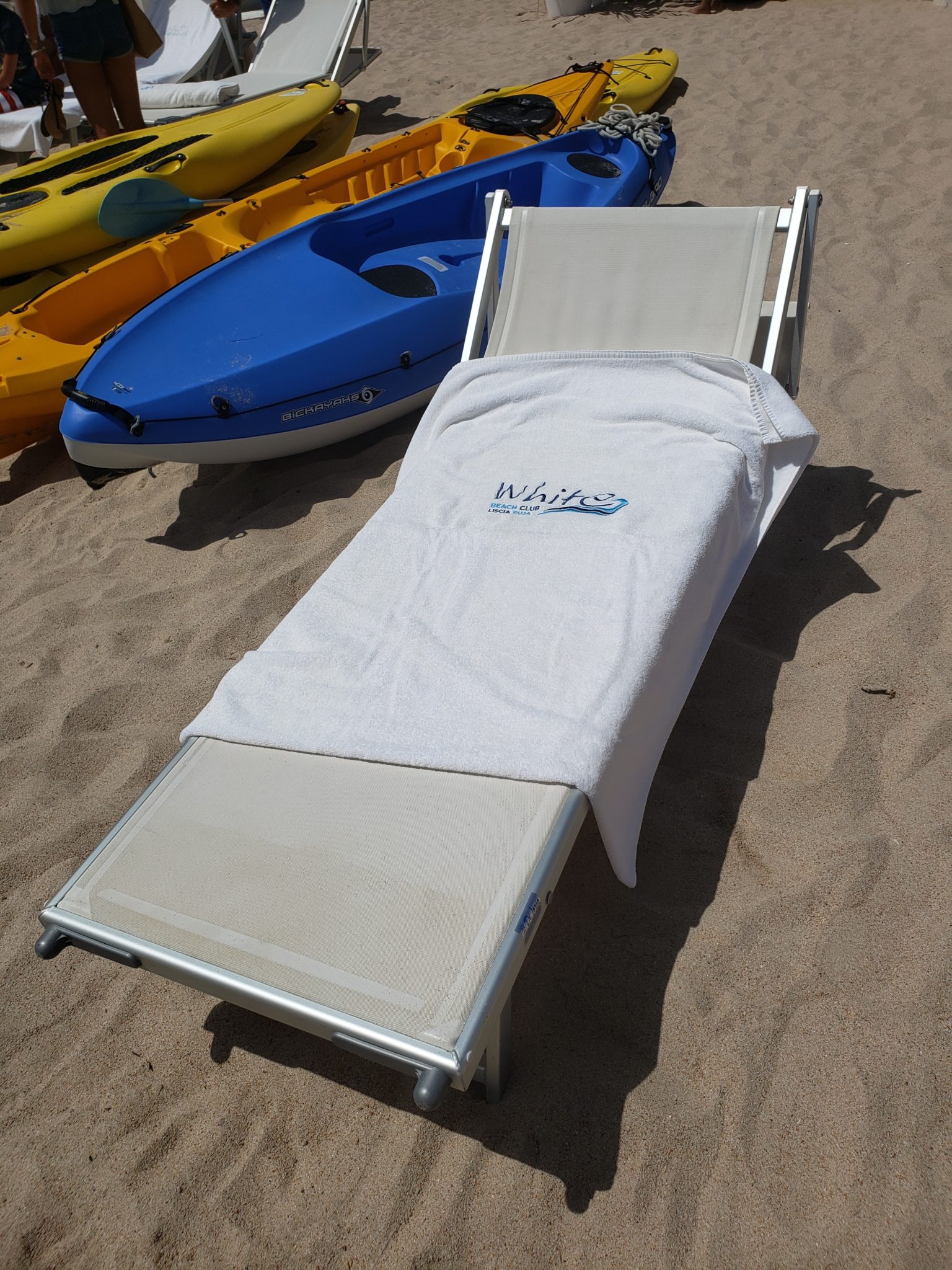 a beach chair with a towel on it