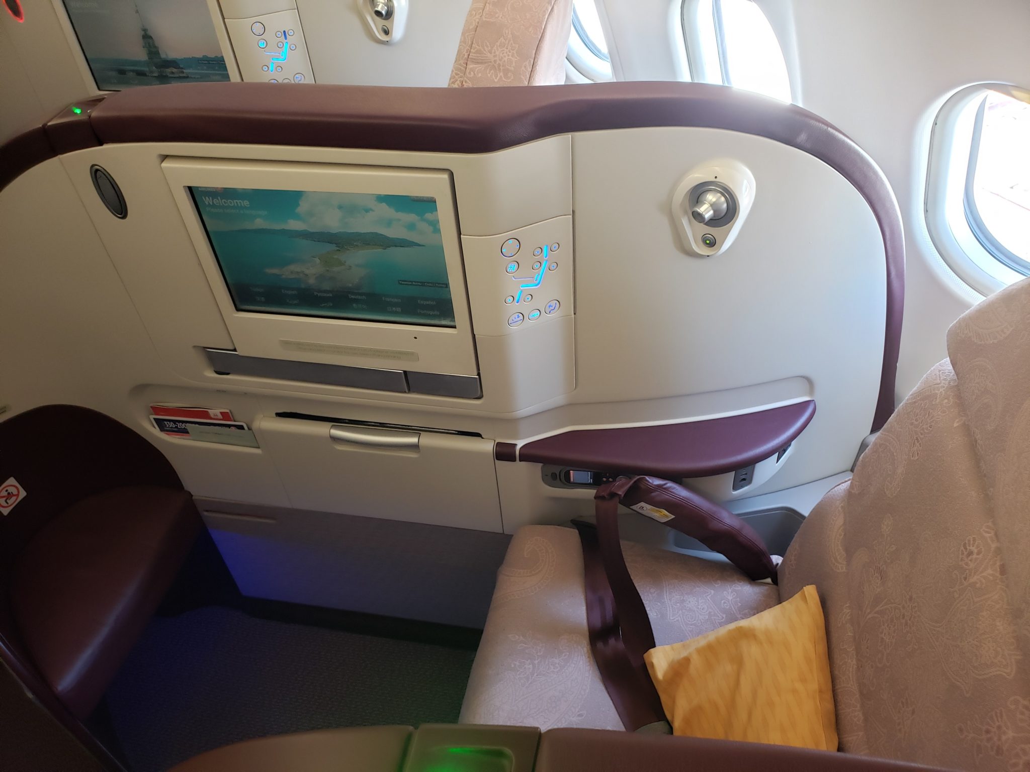 a seat with a screen on the back of the seat