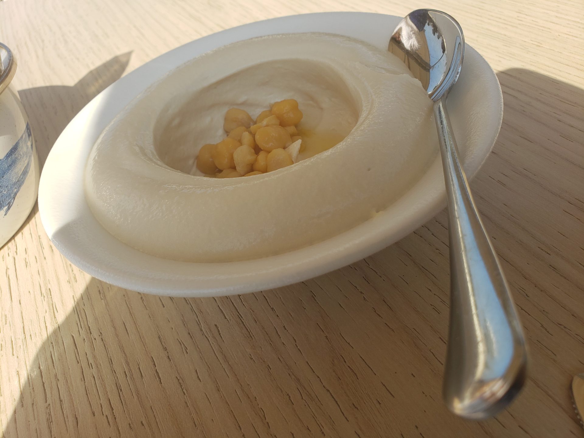 a bowl of food with a spoon