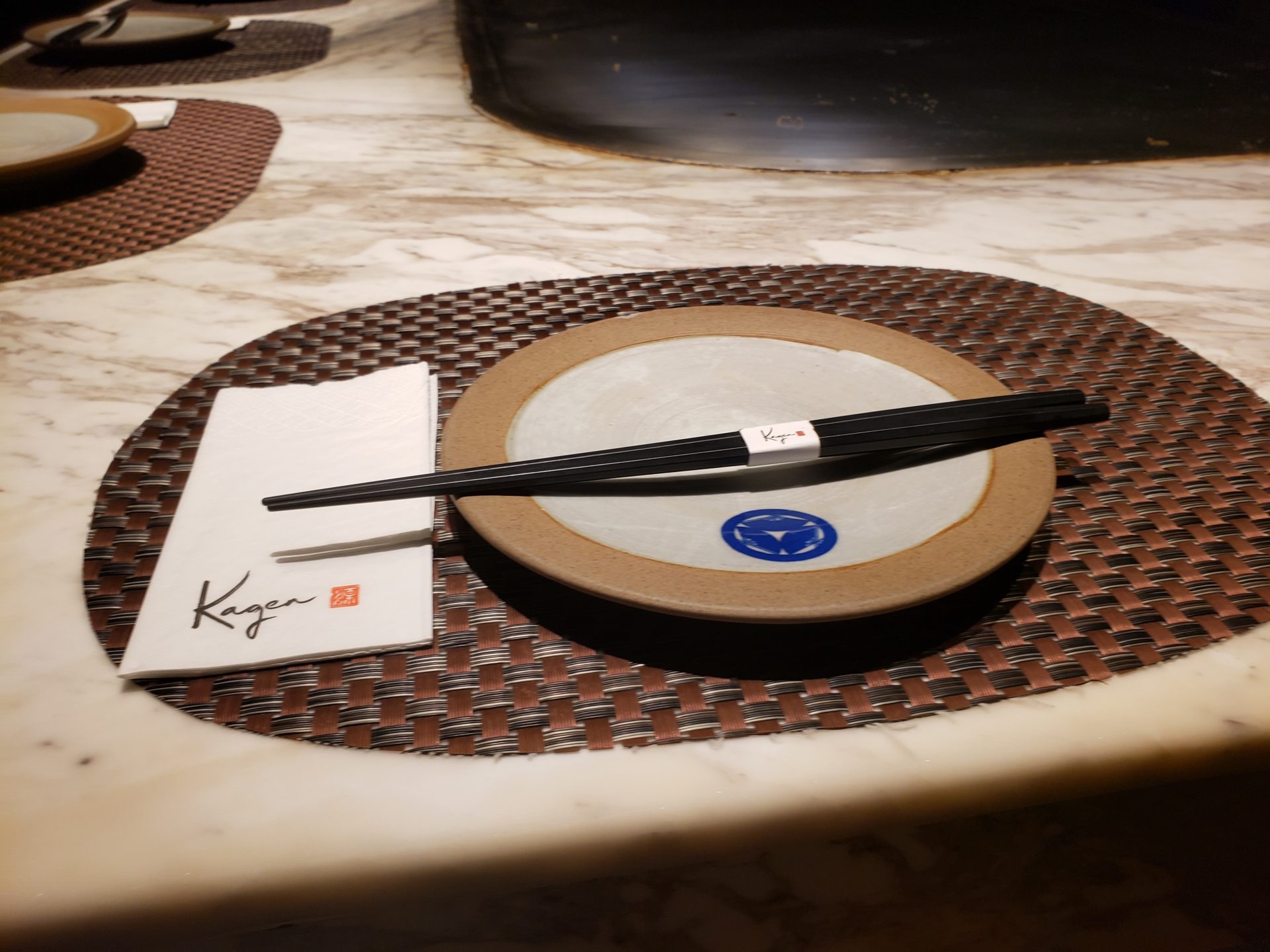 a plate with chopsticks on a table