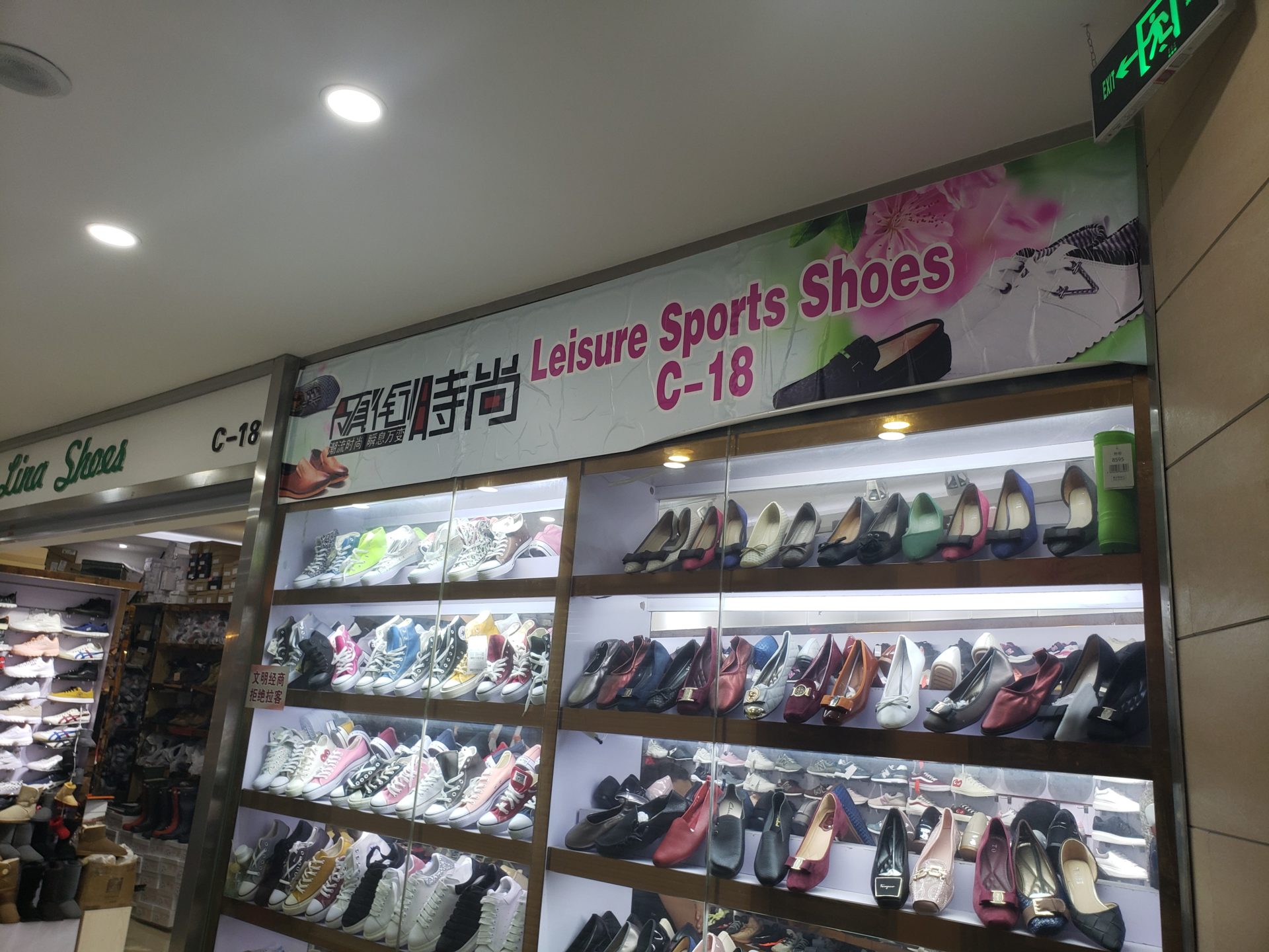 a display of shoes on shelves