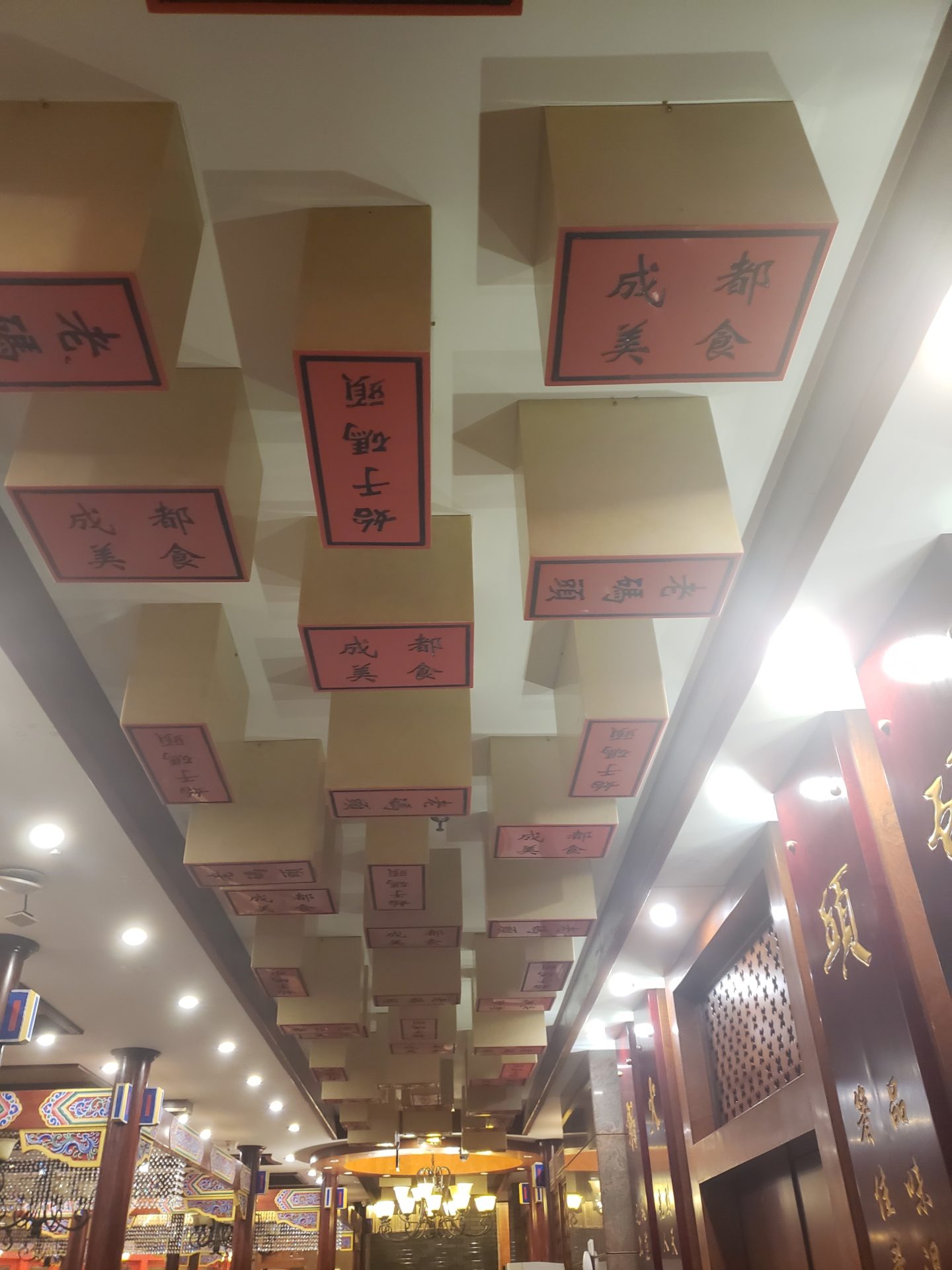 a ceiling with boxes on it