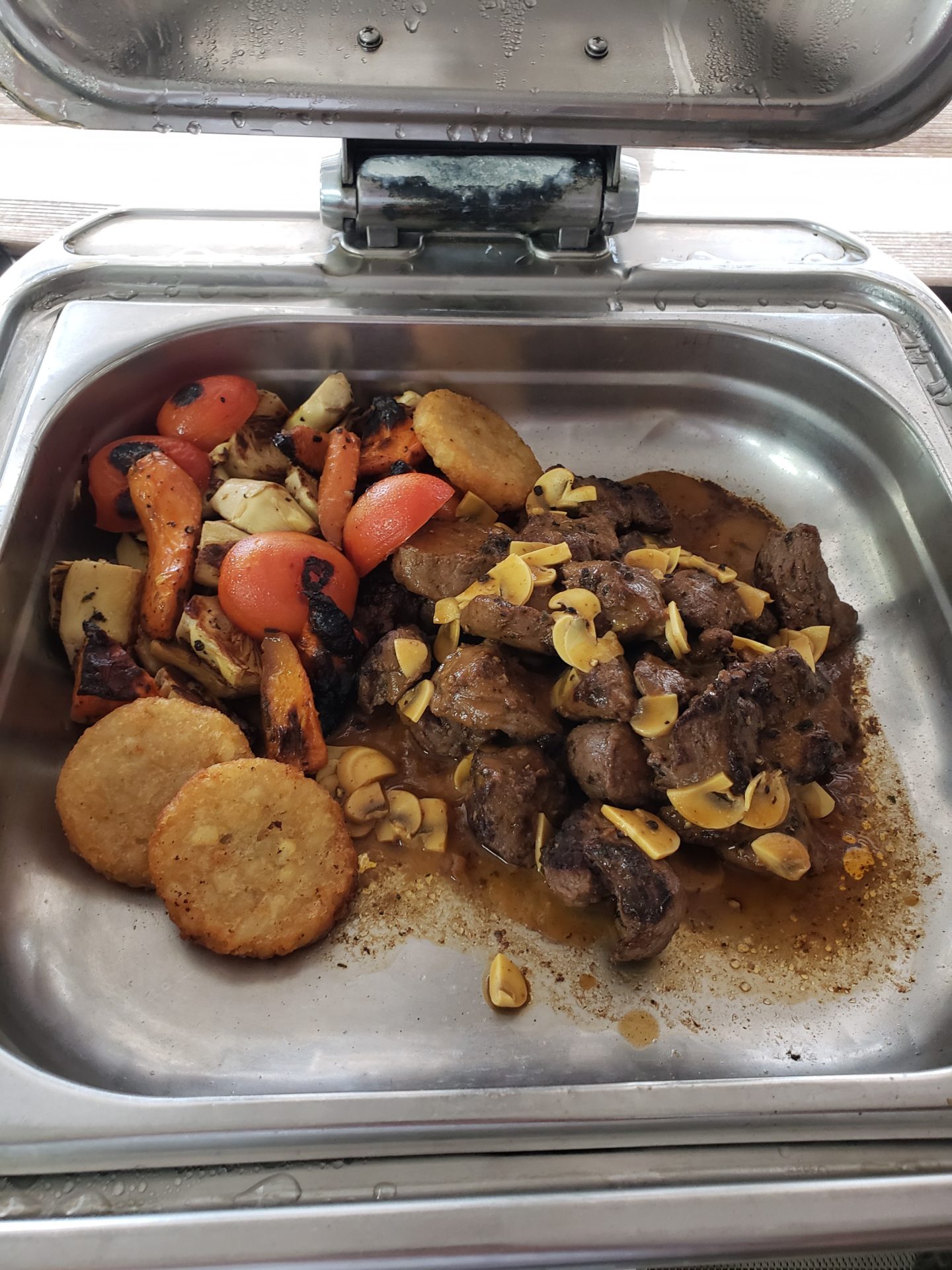 a tray of food with a lid