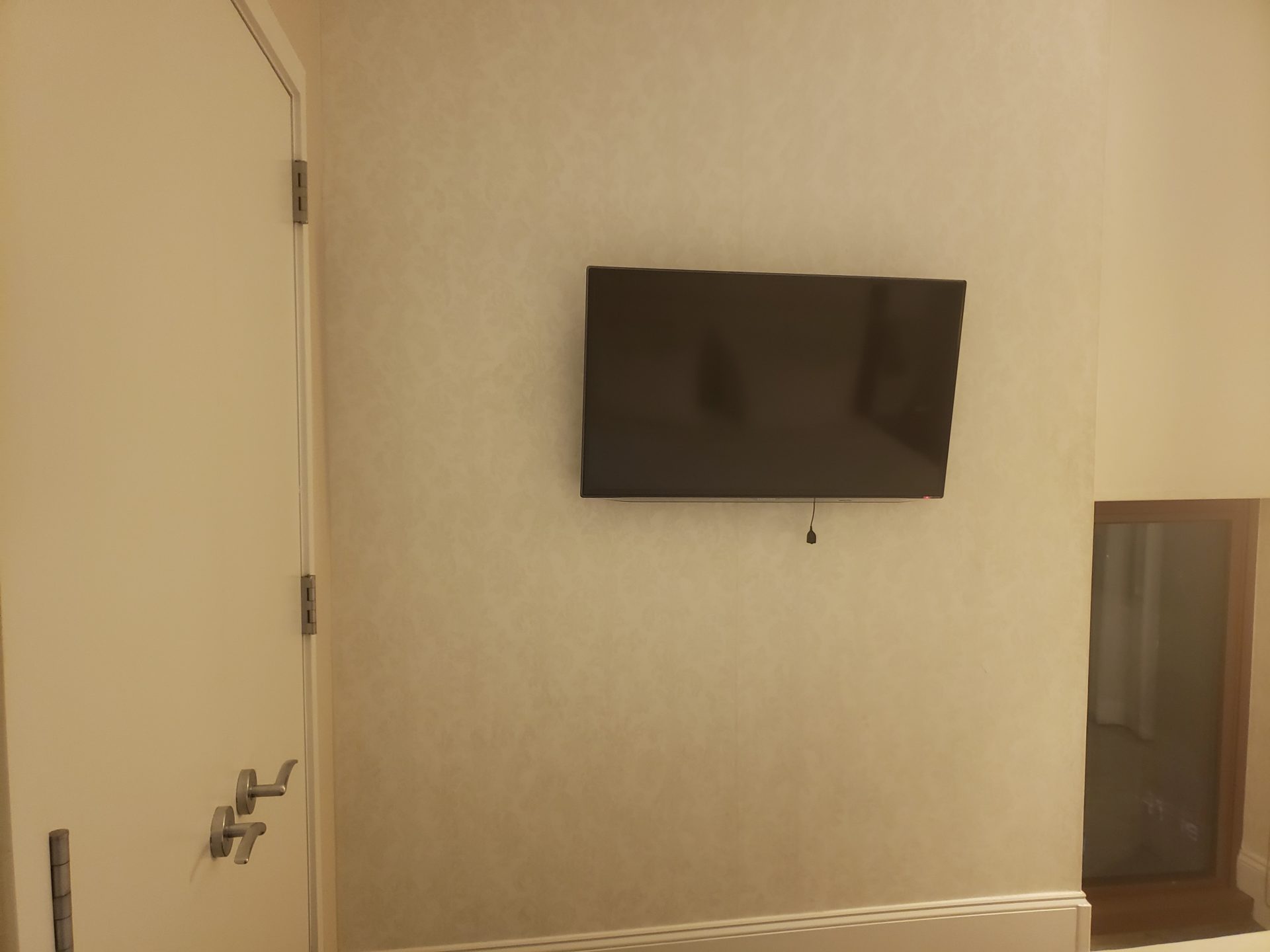a tv mounted on a wall