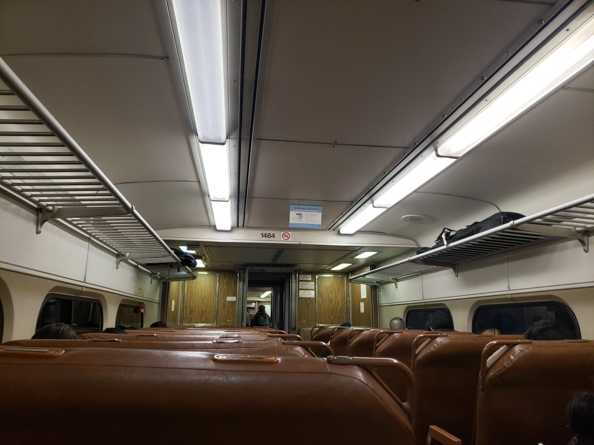 inside a train with brown seats