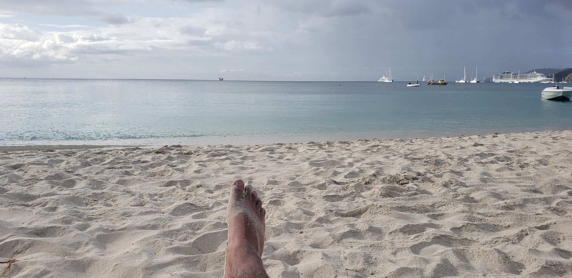 a foot on a beach