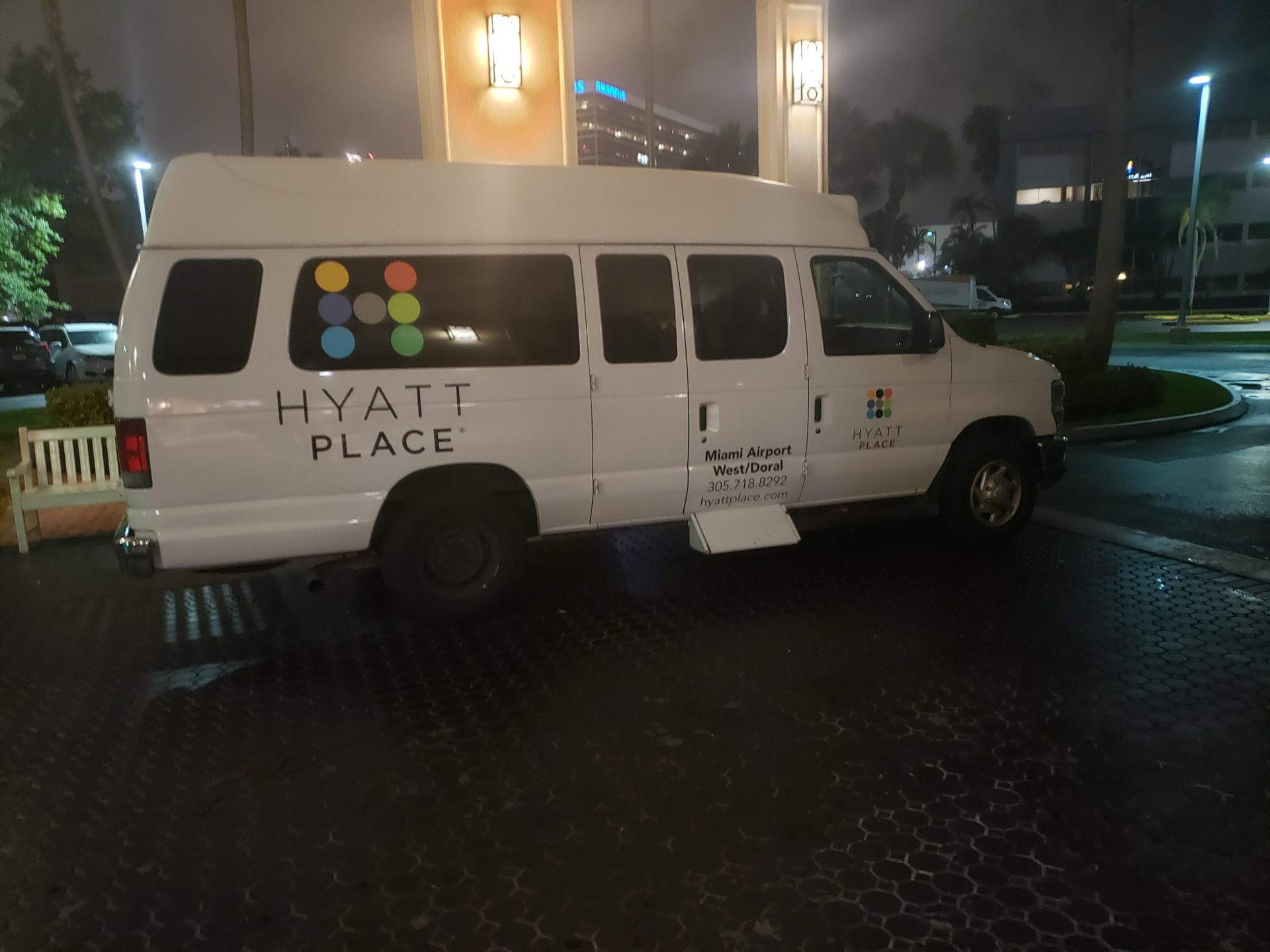 a white van parked in a parking lot