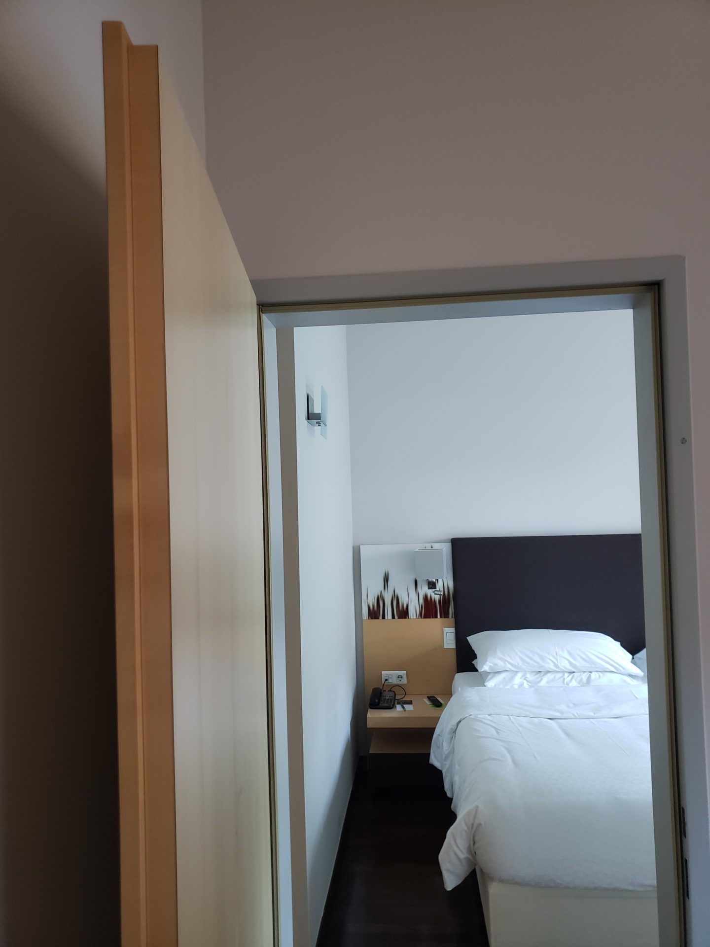 a door open to a bed