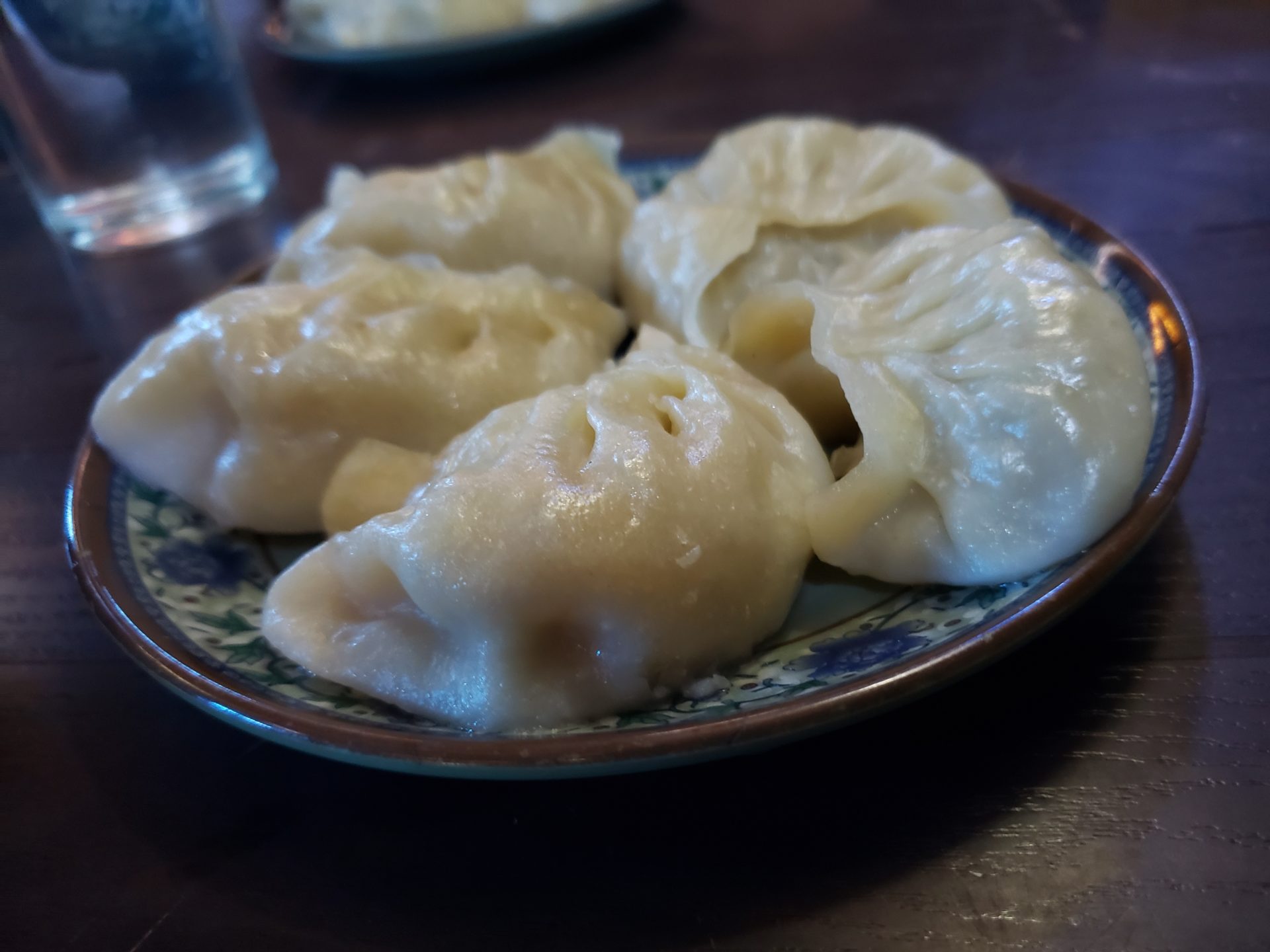 a plate of dumplings on a table