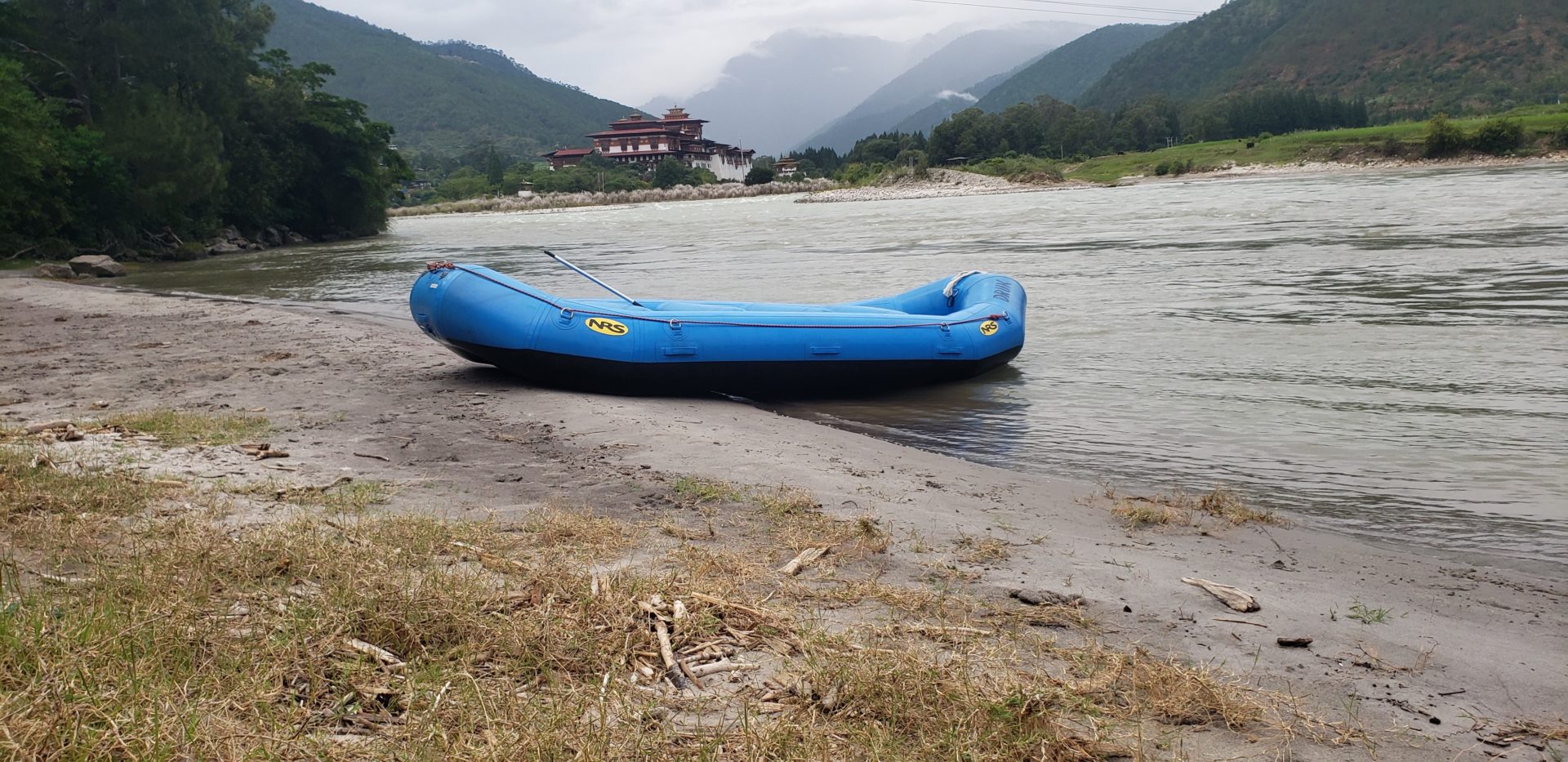 a blue raft on a river
