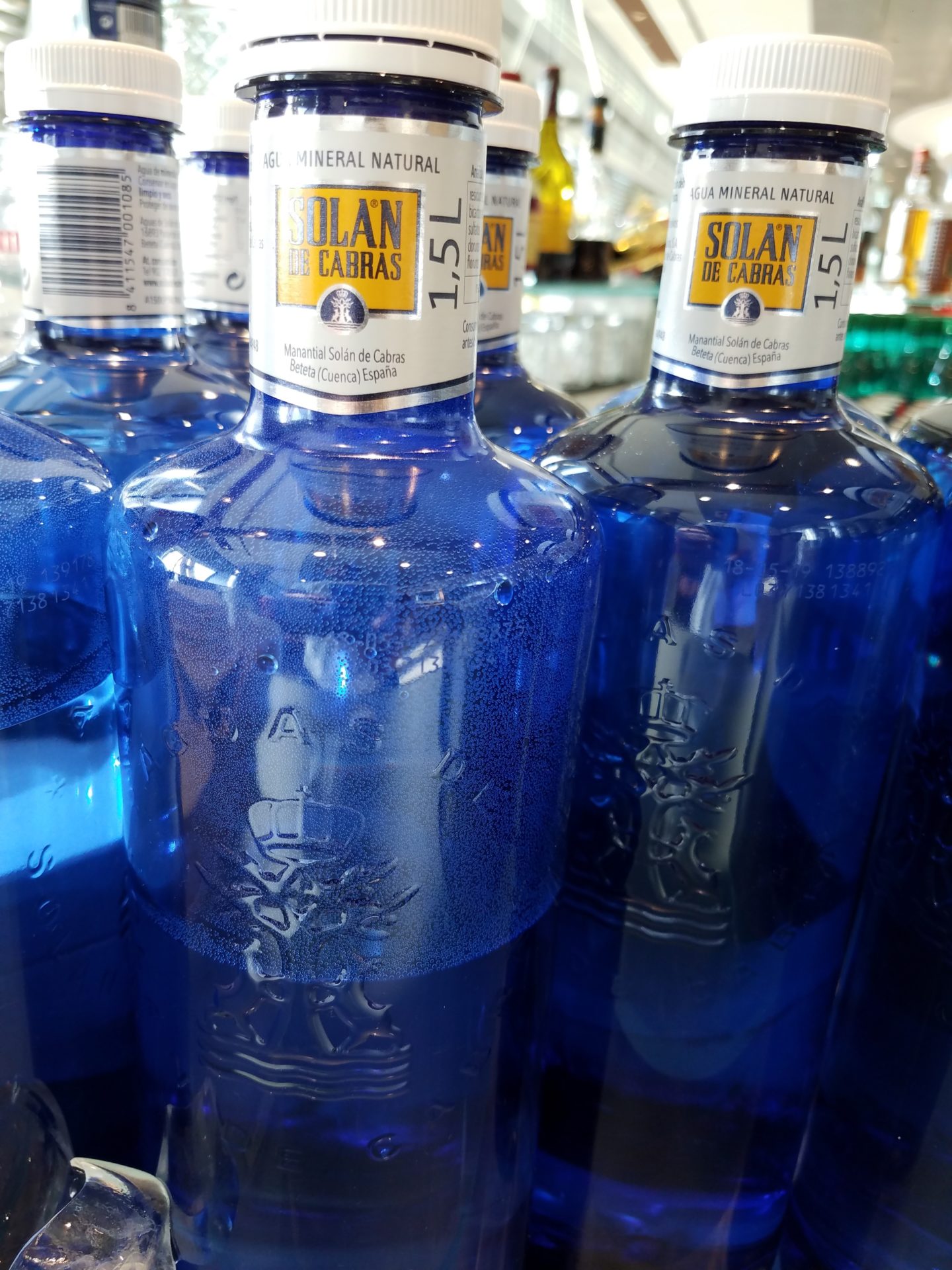 a group of blue bottles