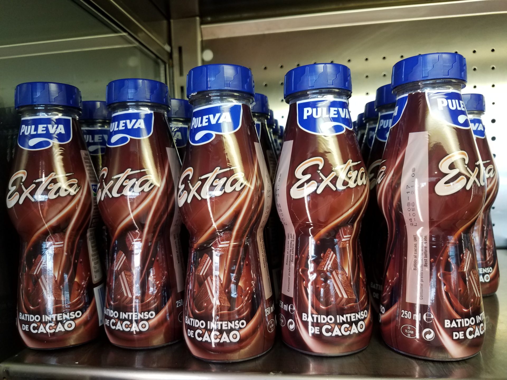 a group of bottles of chocolate drink