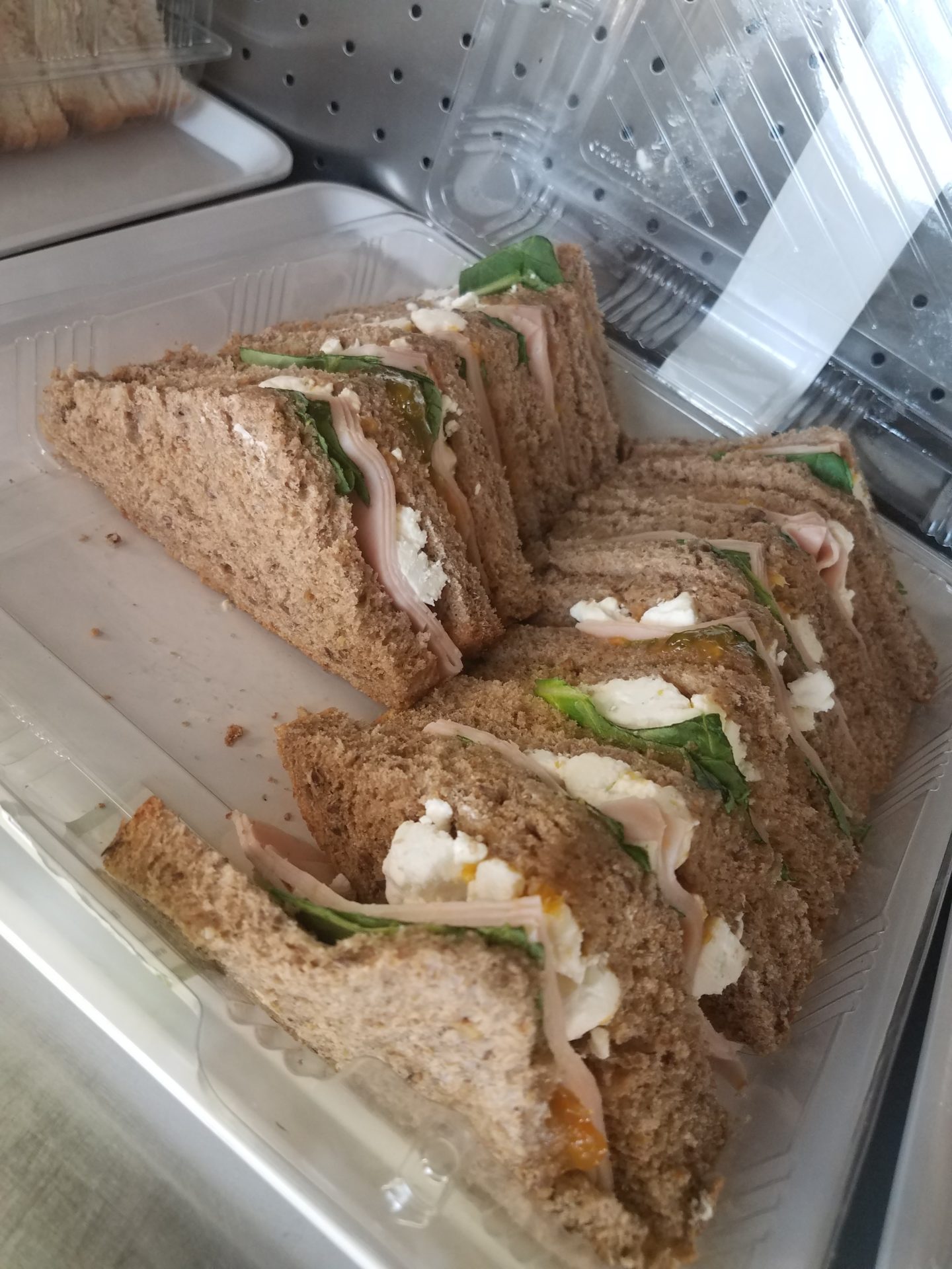 a sandwich in a plastic container