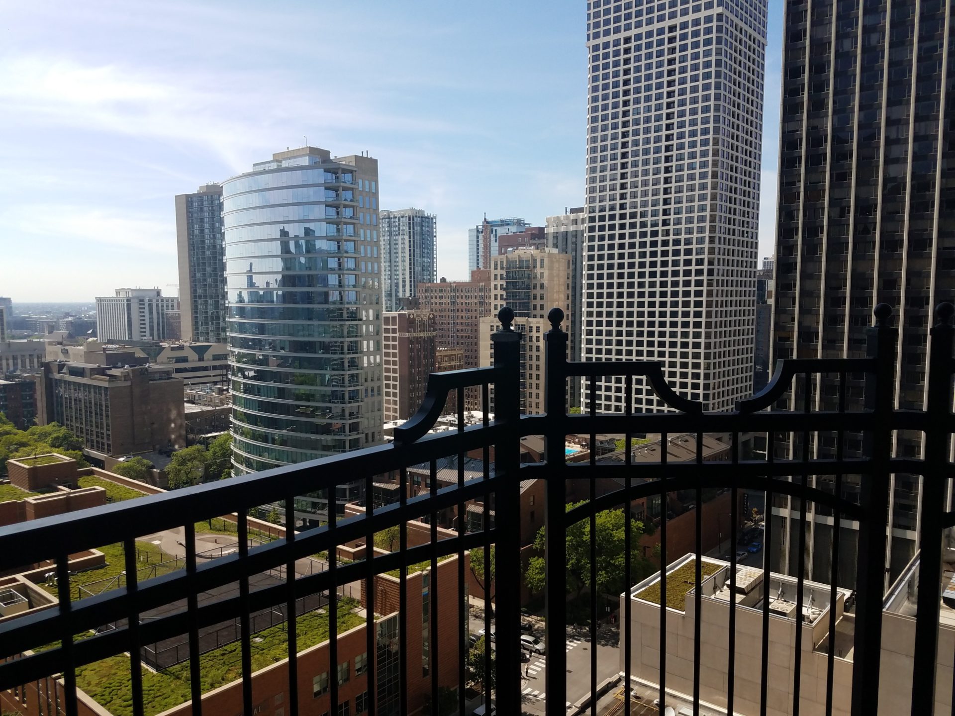 a balcony overlooking a city