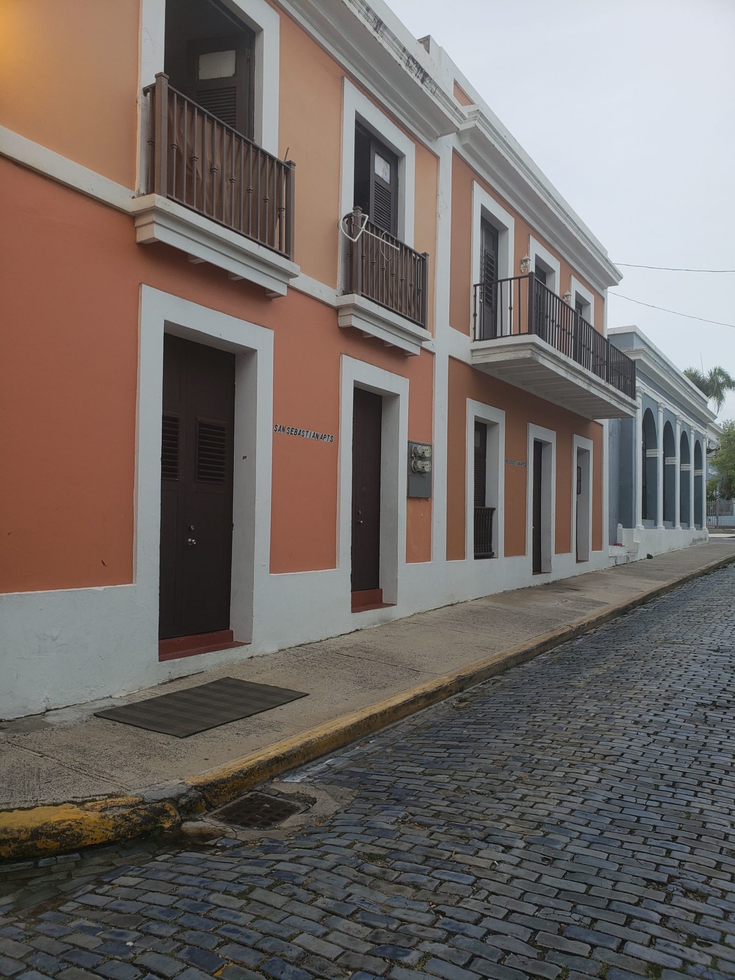 a street with a row of buildings