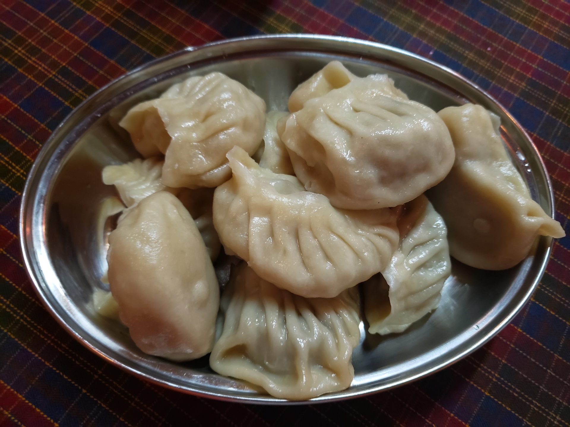 a plate of dumplings on a table