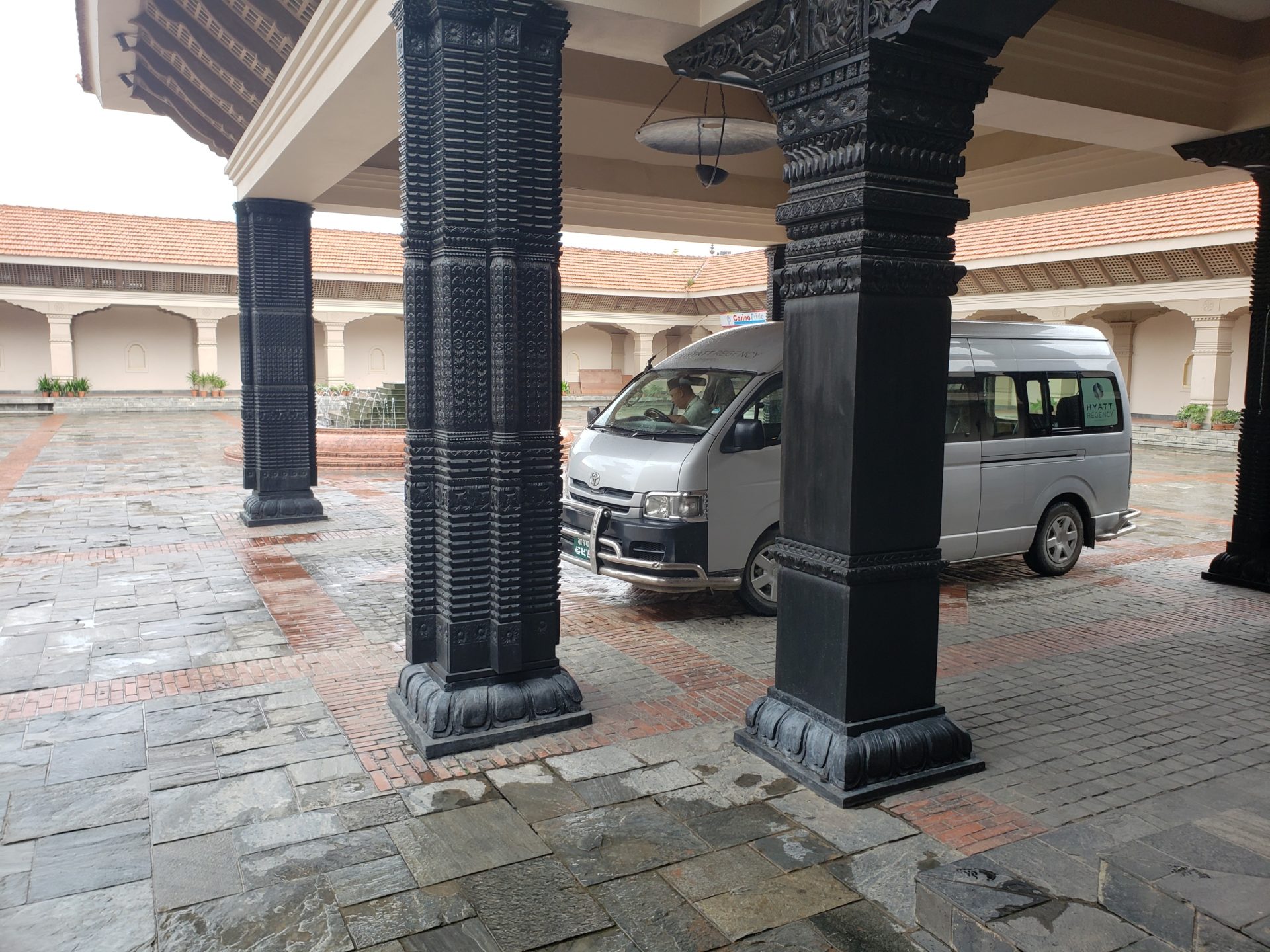 a van parked under a covered area