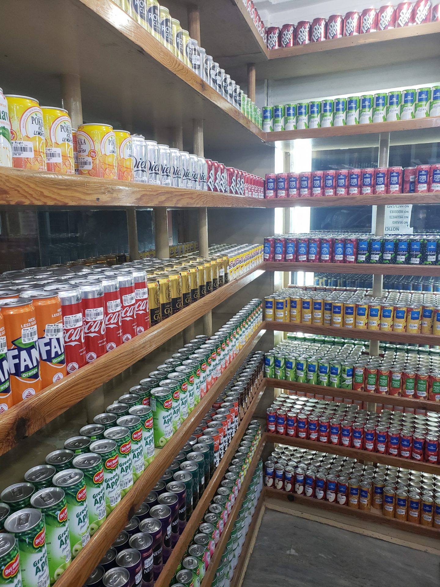 shelves with cans of beer and cans of different flavors