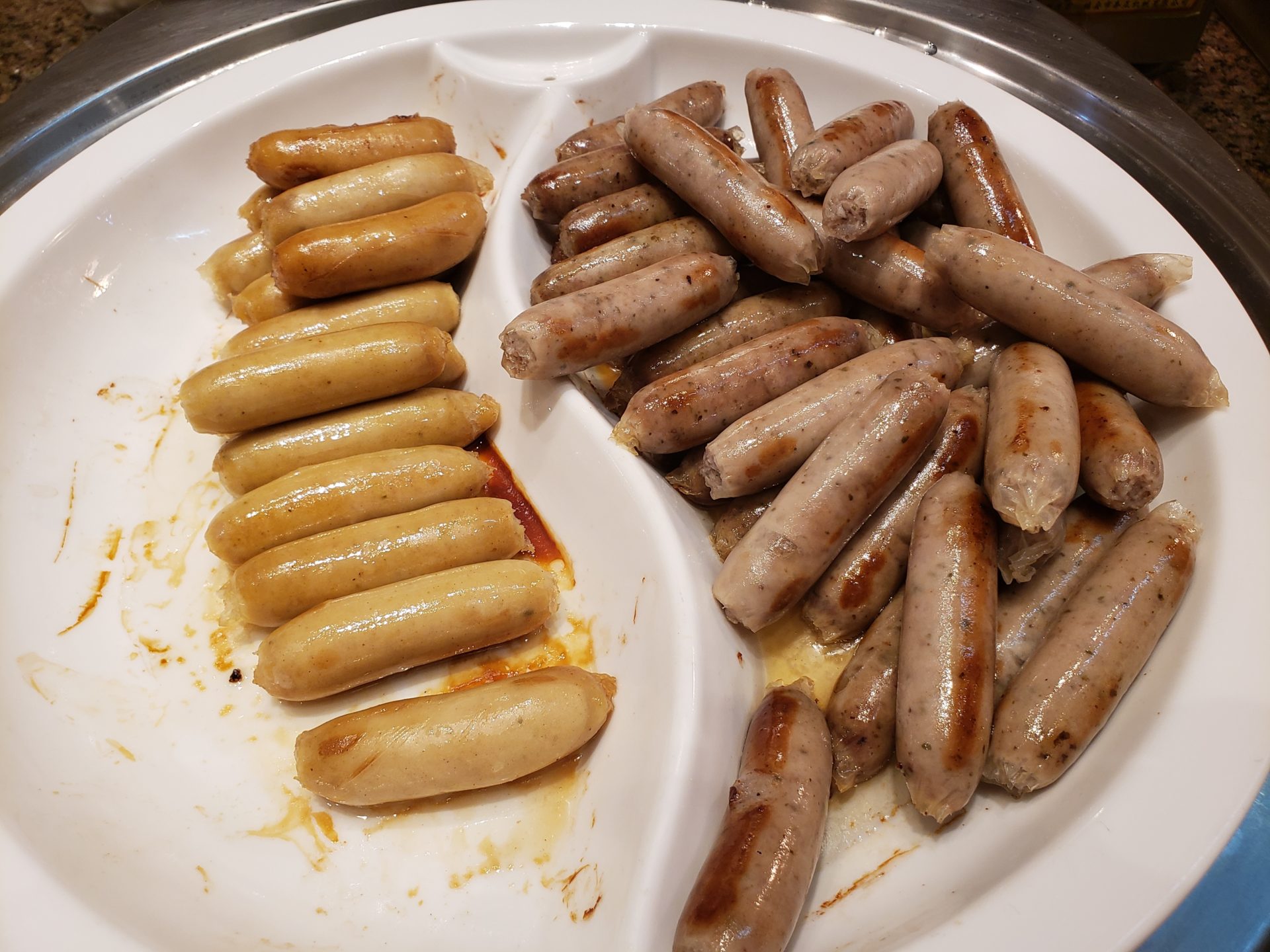 a plate of sausages and sausages
