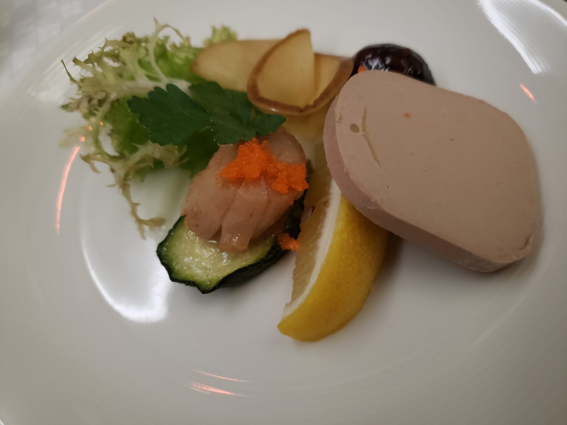 a plate of food on a white plate