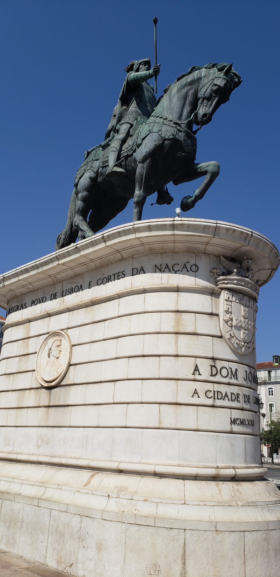 a statue of a horse on a pedestal