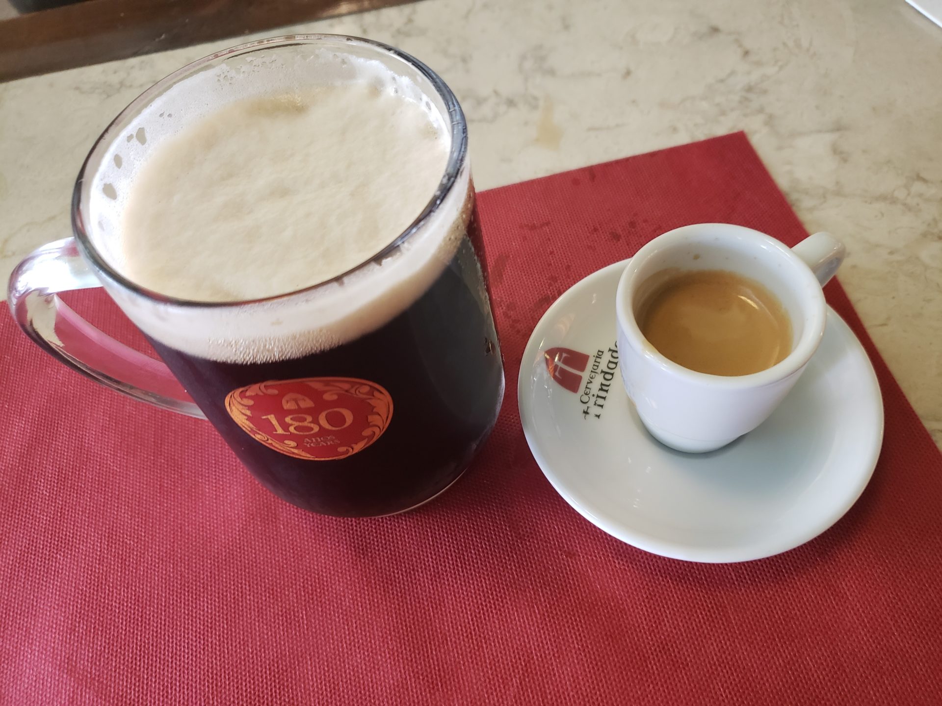 a cup of coffee and a glass of beer