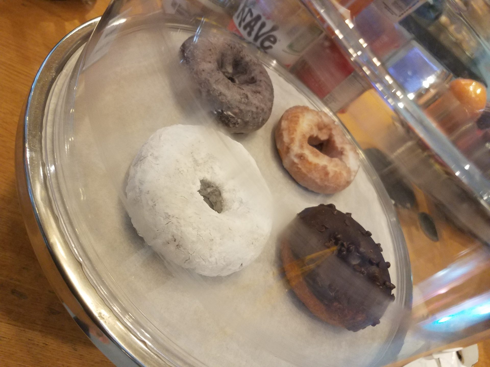 a group of donuts on a tray