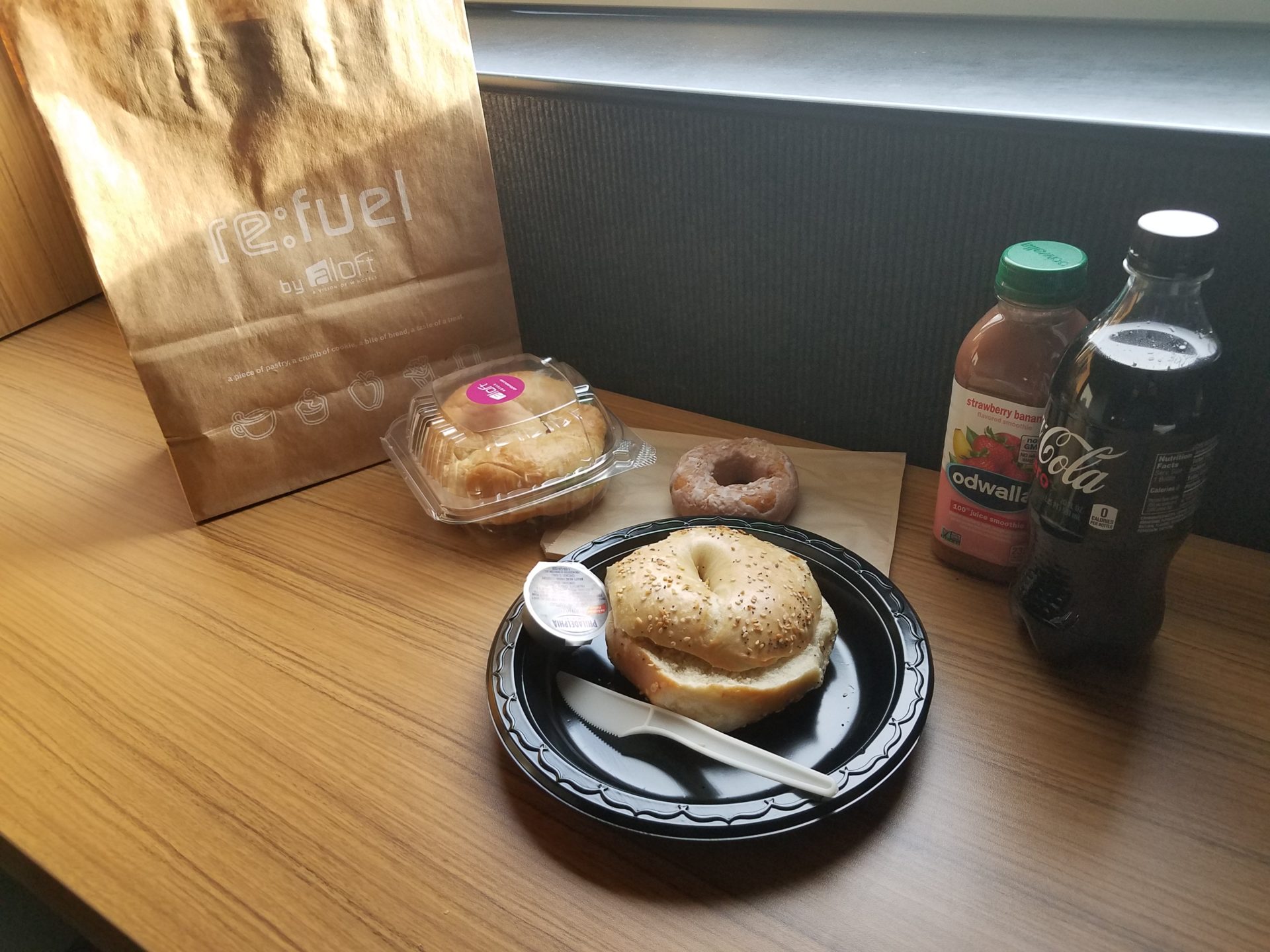 a bagel and donut on a table