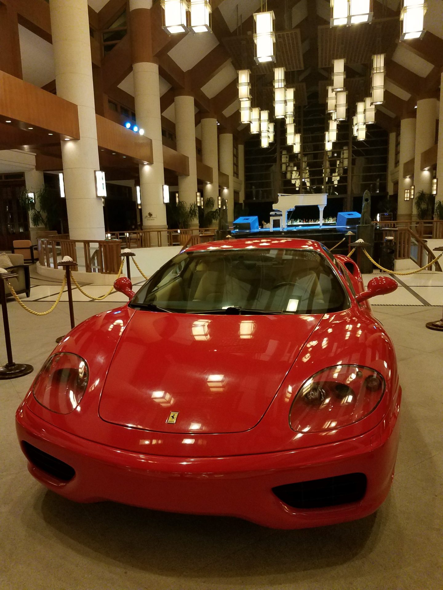 a red sports car in a large building