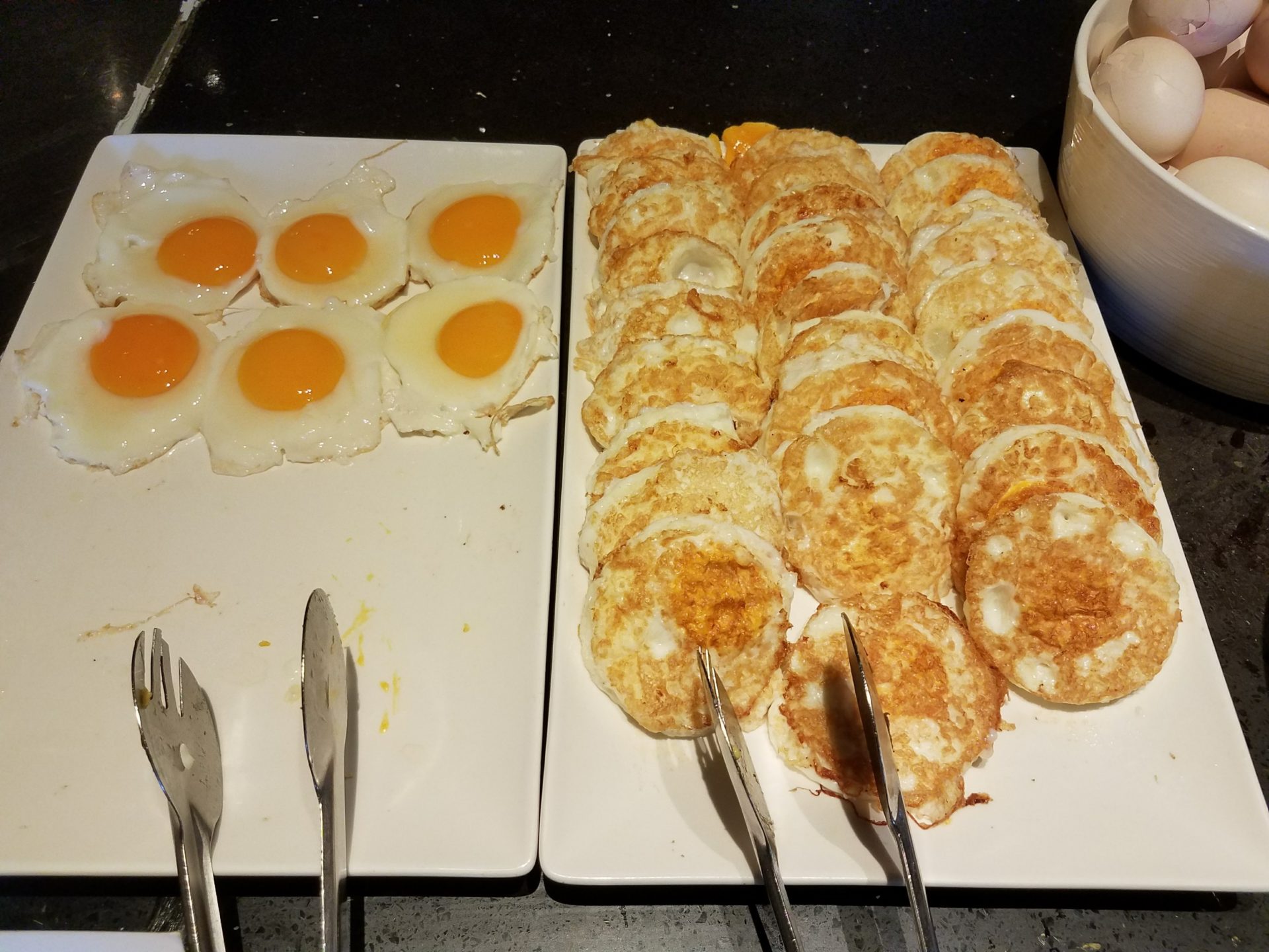 a plate of eggs and eggs on a table