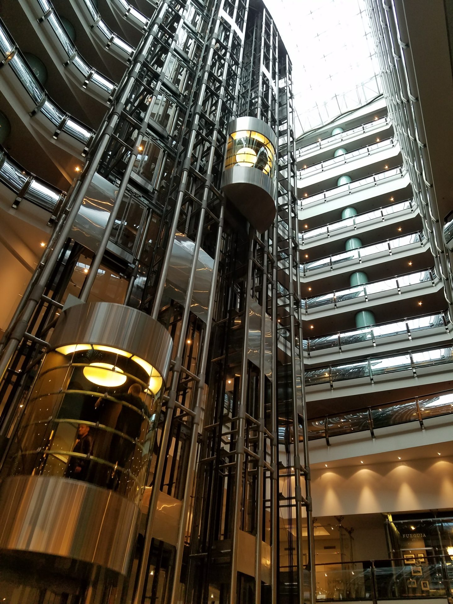 a glass elevator in a building