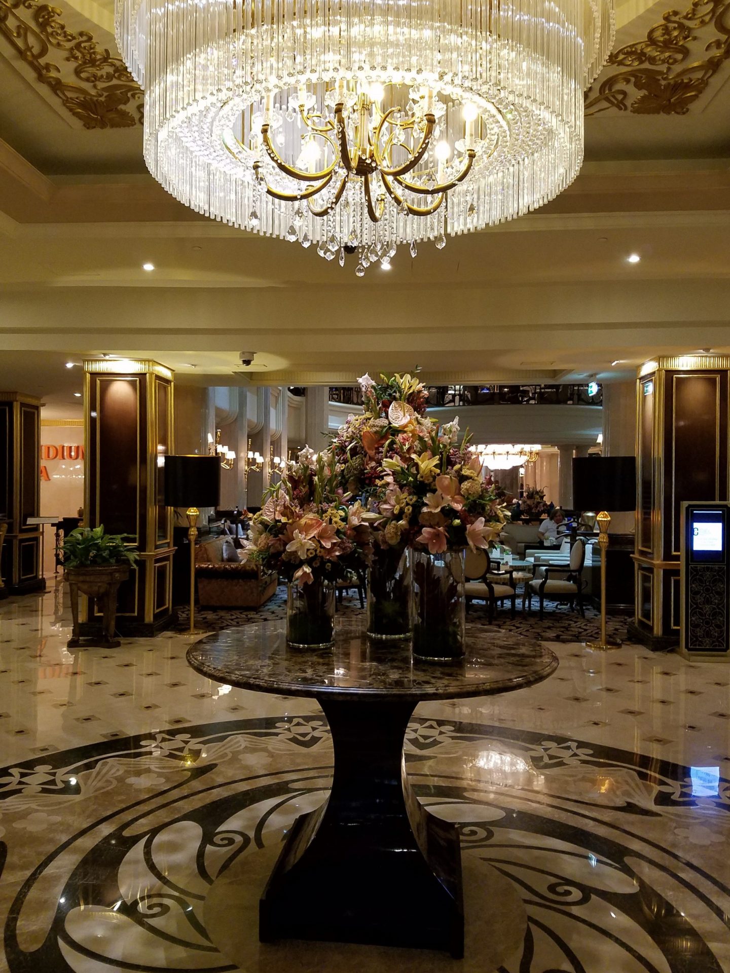 a chandelier in a hotel lobby