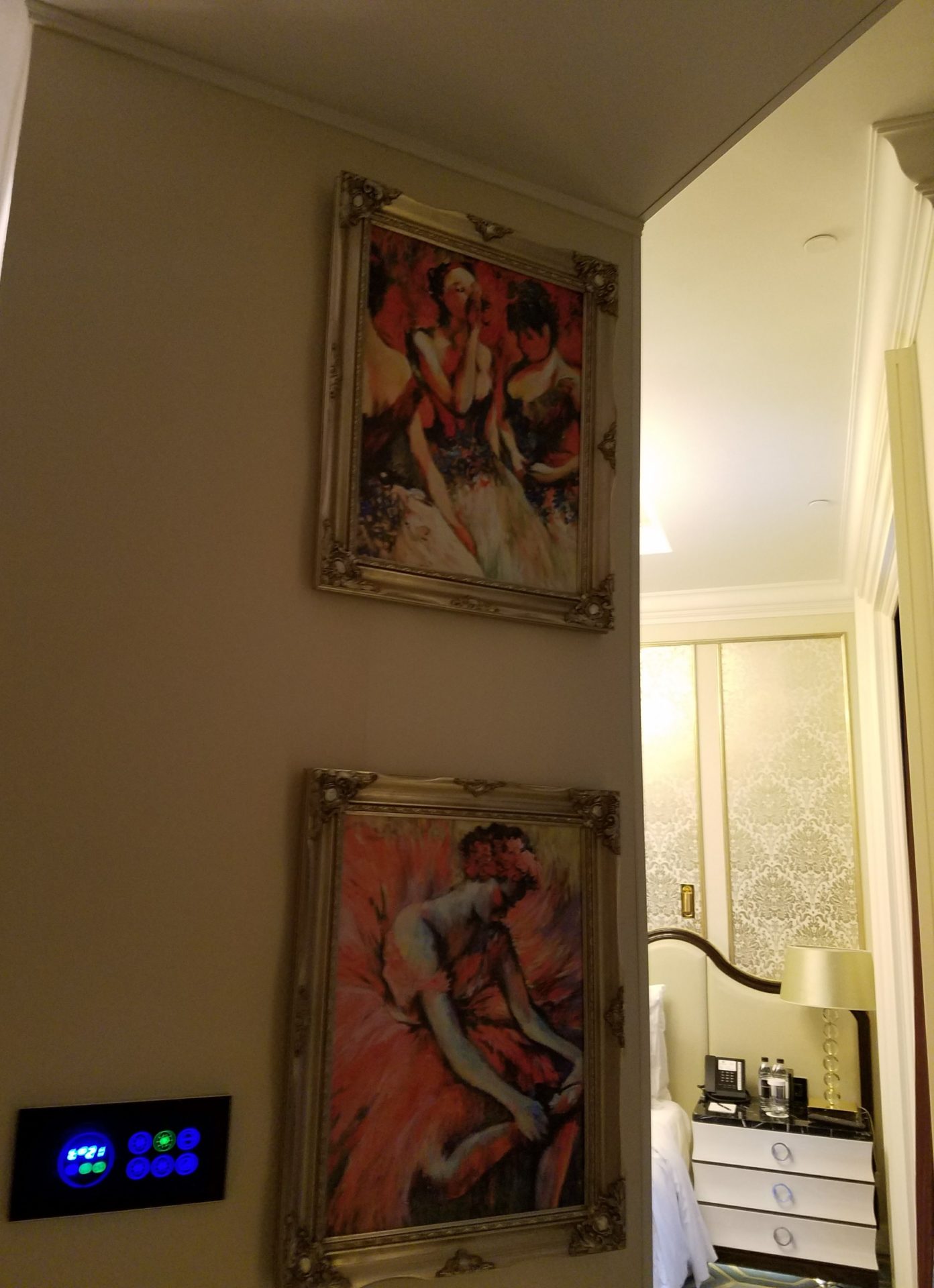 two framed pictures on a wall