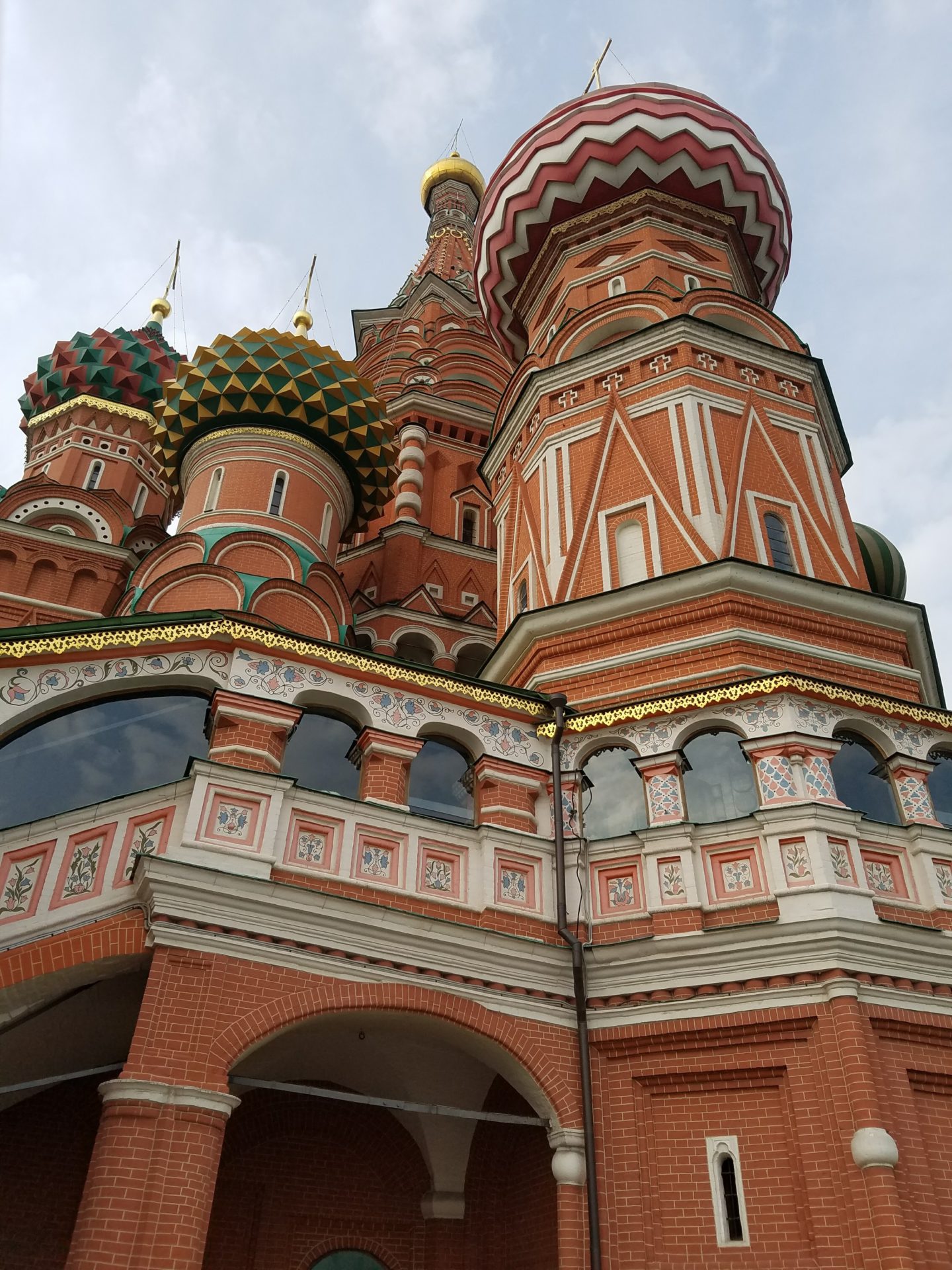 a large building with colorful domes