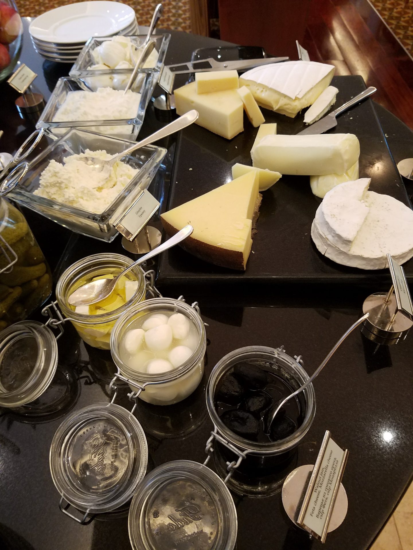 a table with different types of cheeses