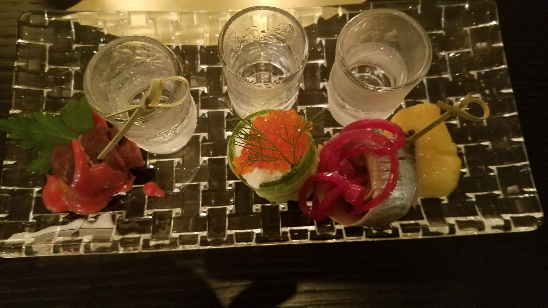 a group of glasses with food on it