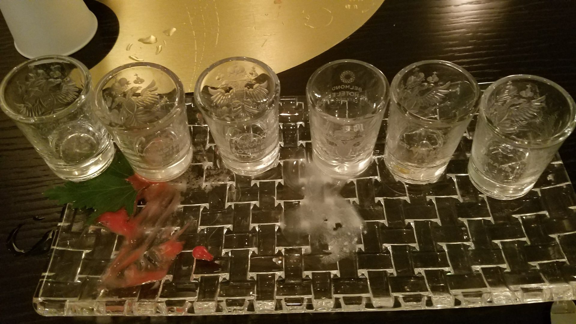 a group of glasses on a tray