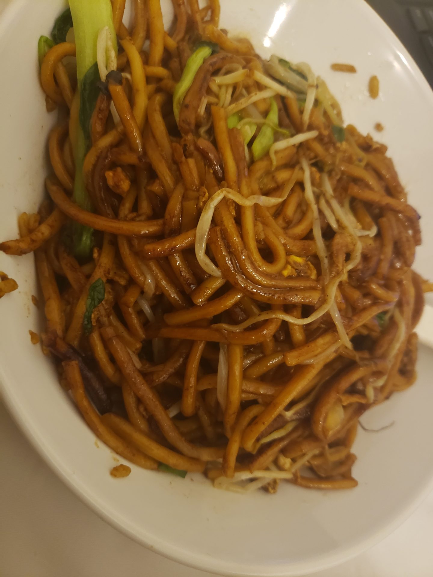 a plate of noodles and vegetables