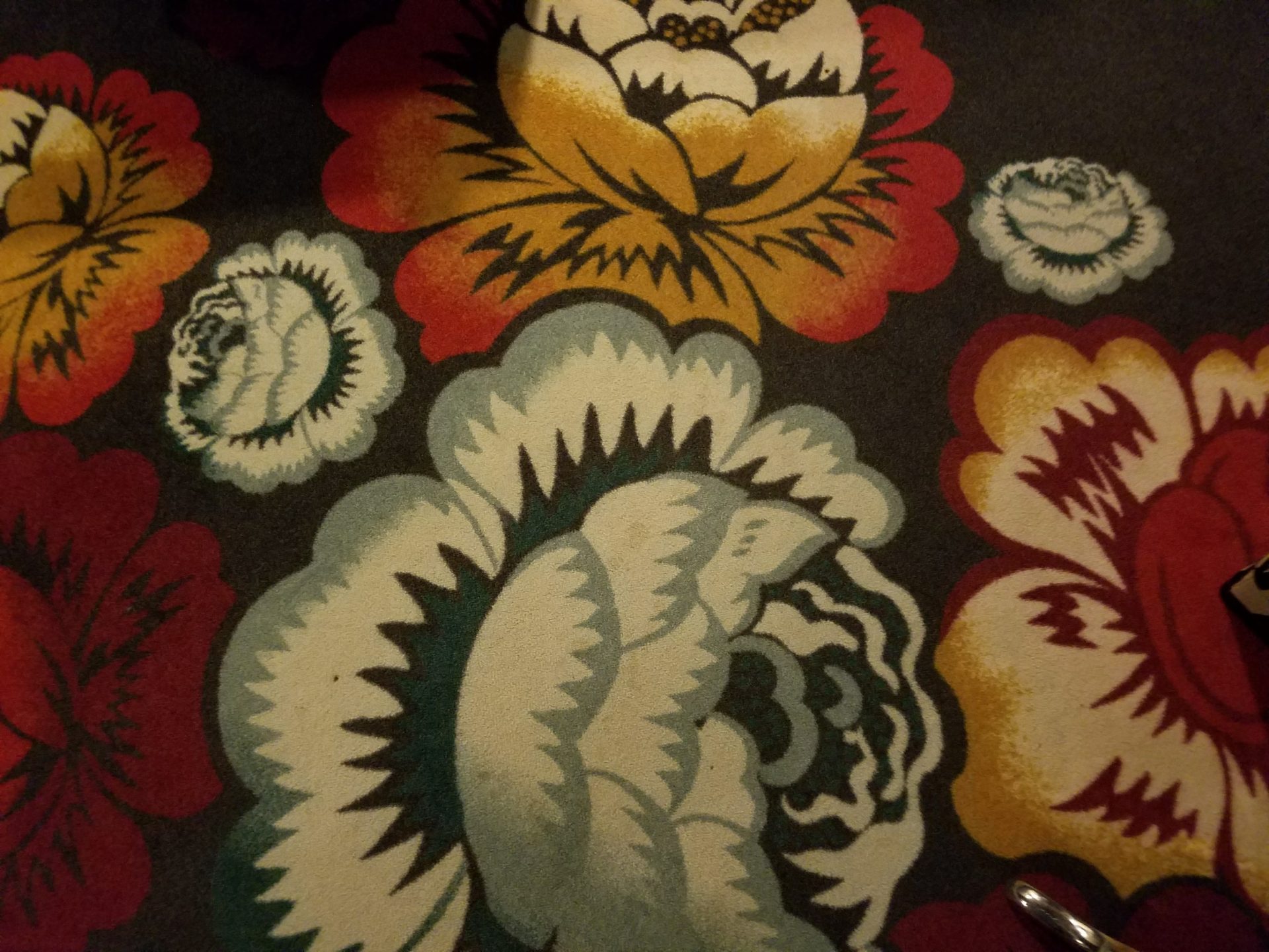 a colorful floral pattern on a carpet