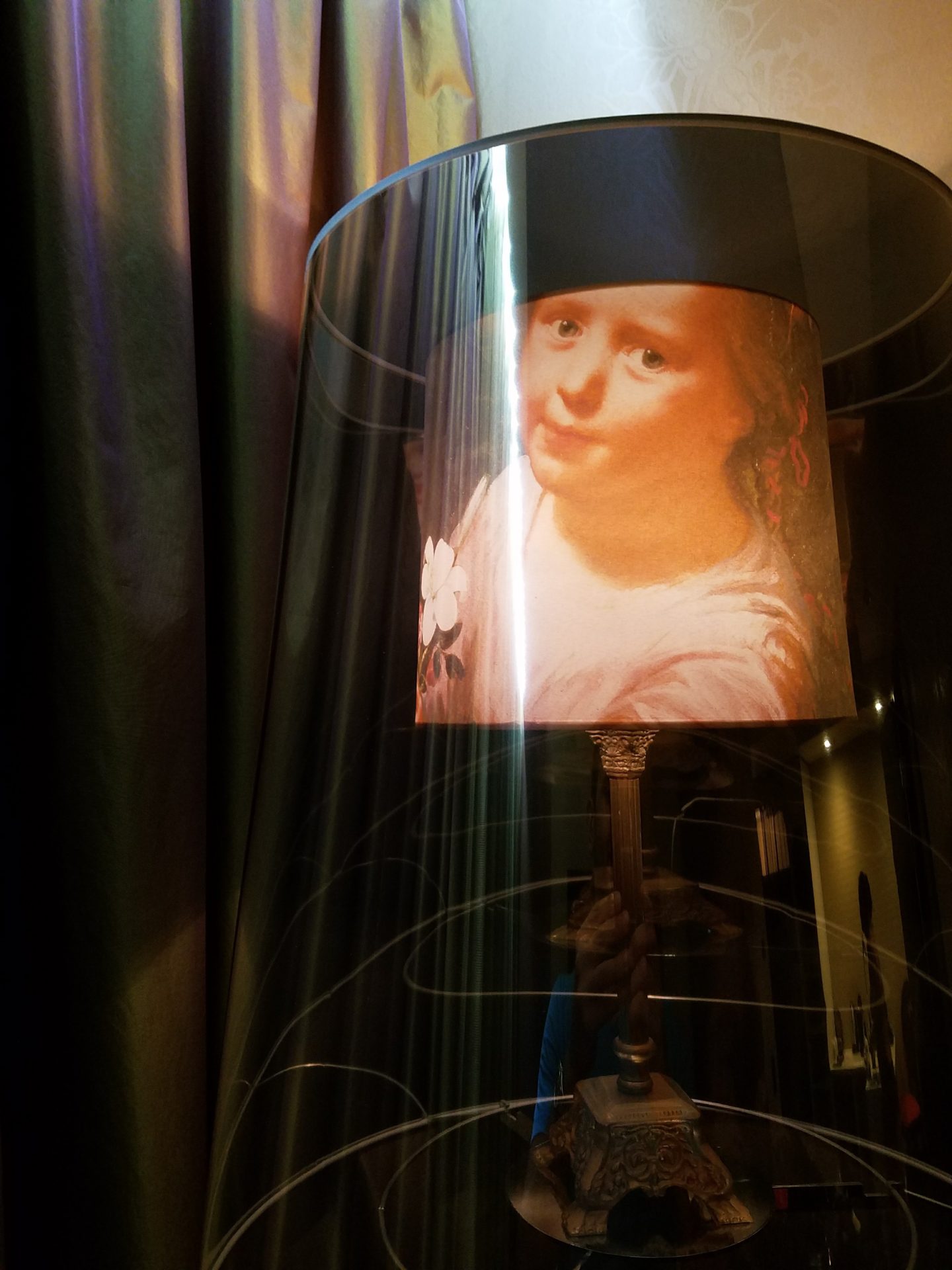 a lamp shade with a picture of a girl