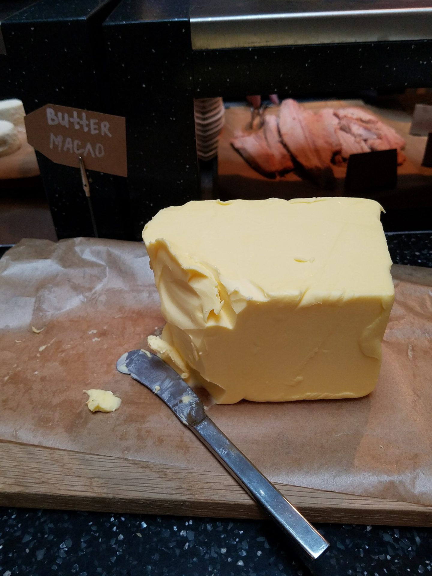 a block of butter on a cutting board