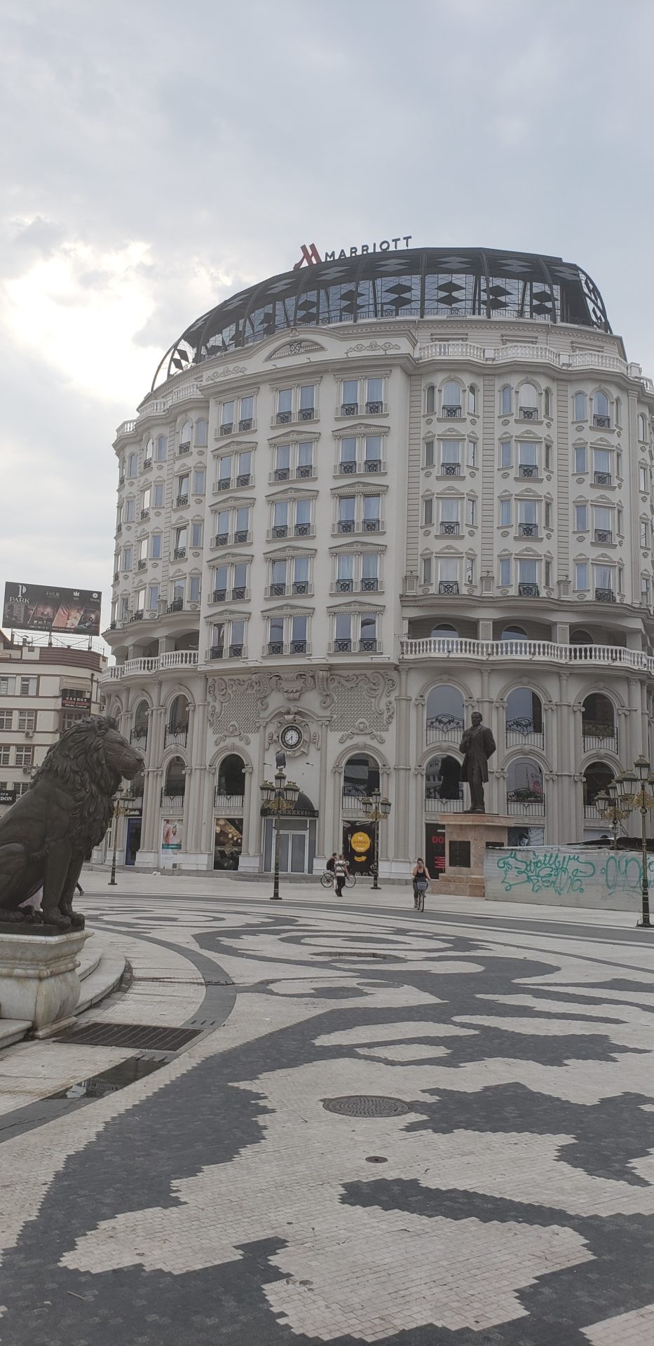 a large building with a statue of a lion