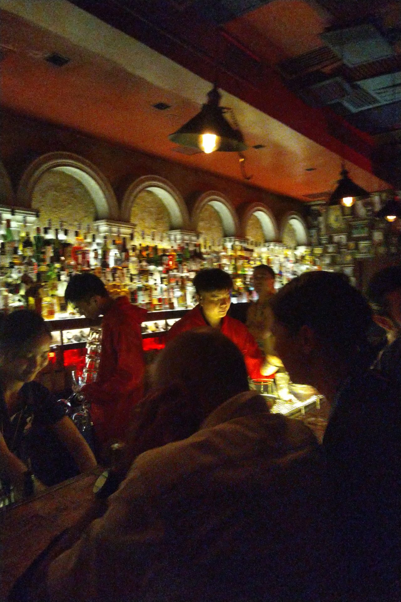 a group of people at a bar