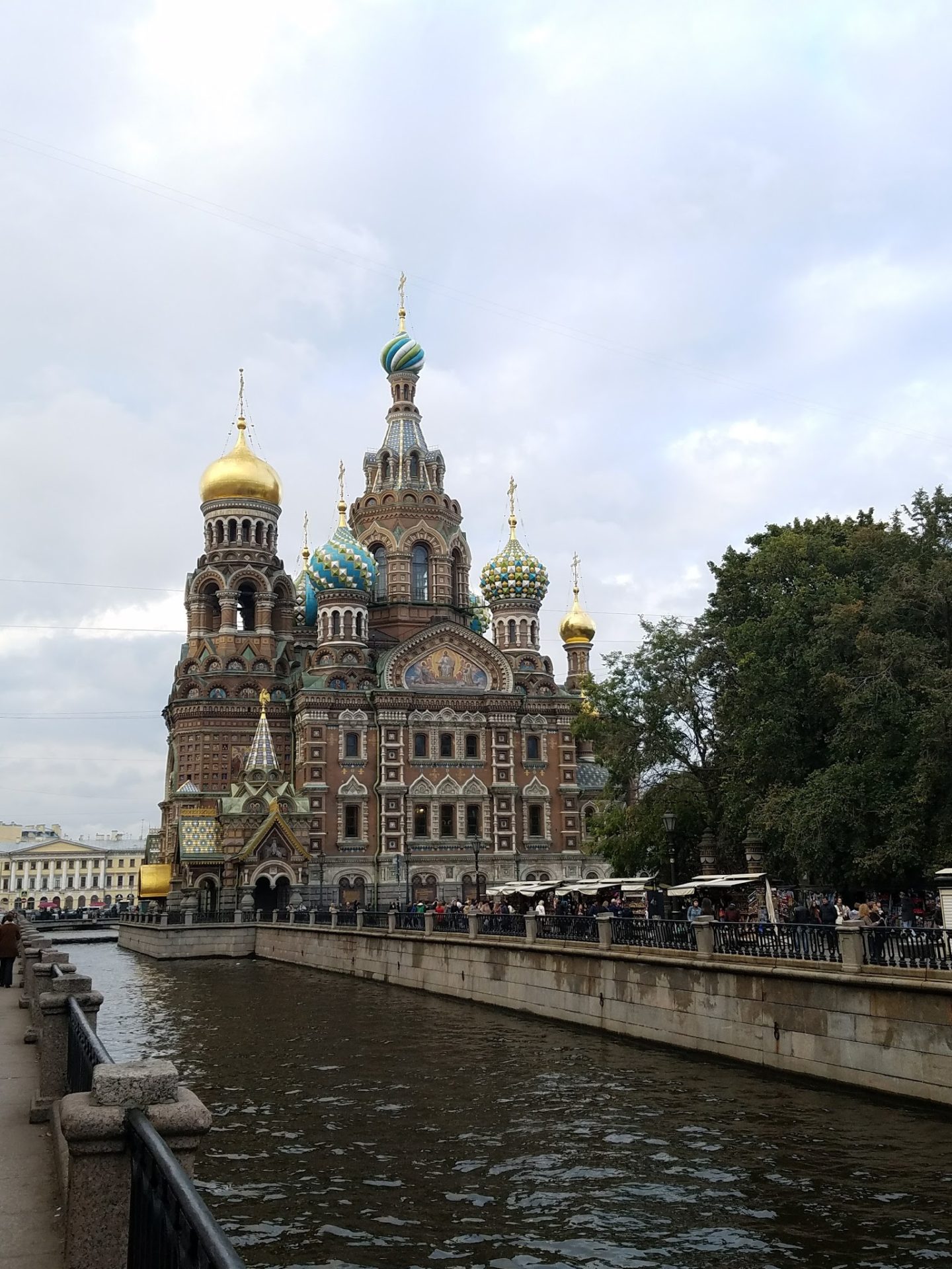 Church of the Savior on Blood with many domes and a canal