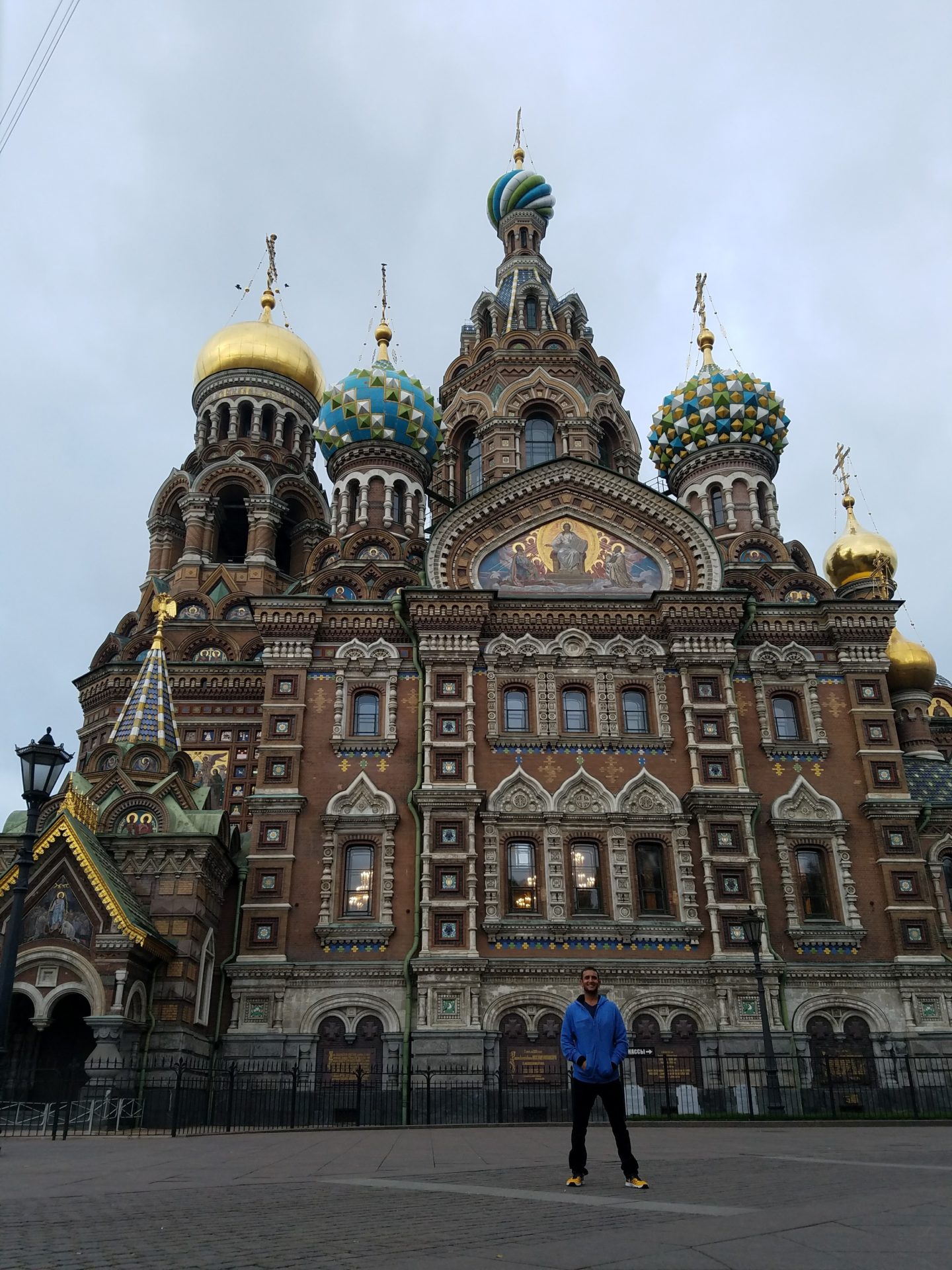 a man standing in front of Church of the Savior on Blood