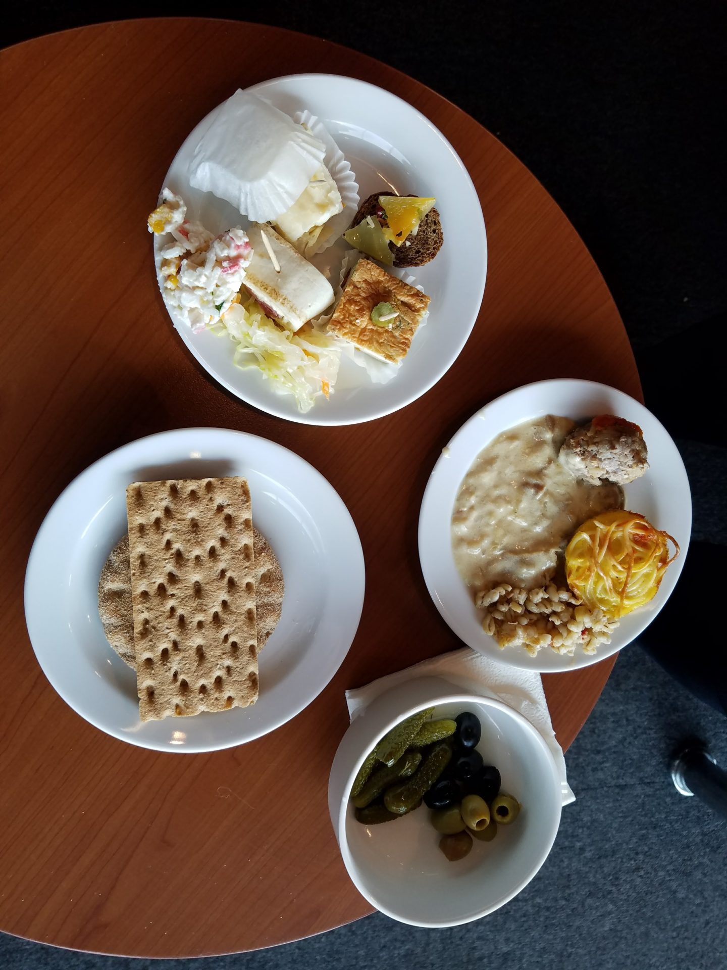 a group of plates of food on a table
