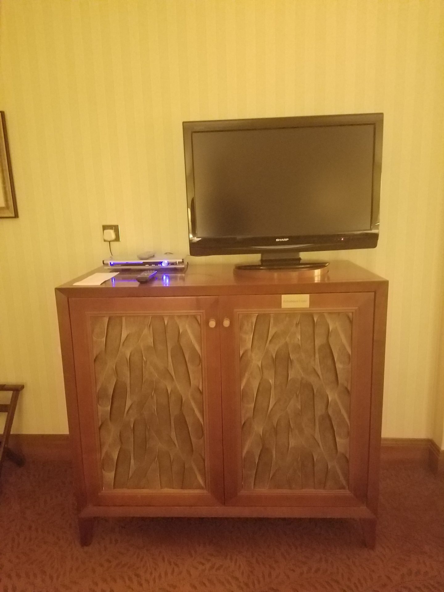 a tv on a cabinet