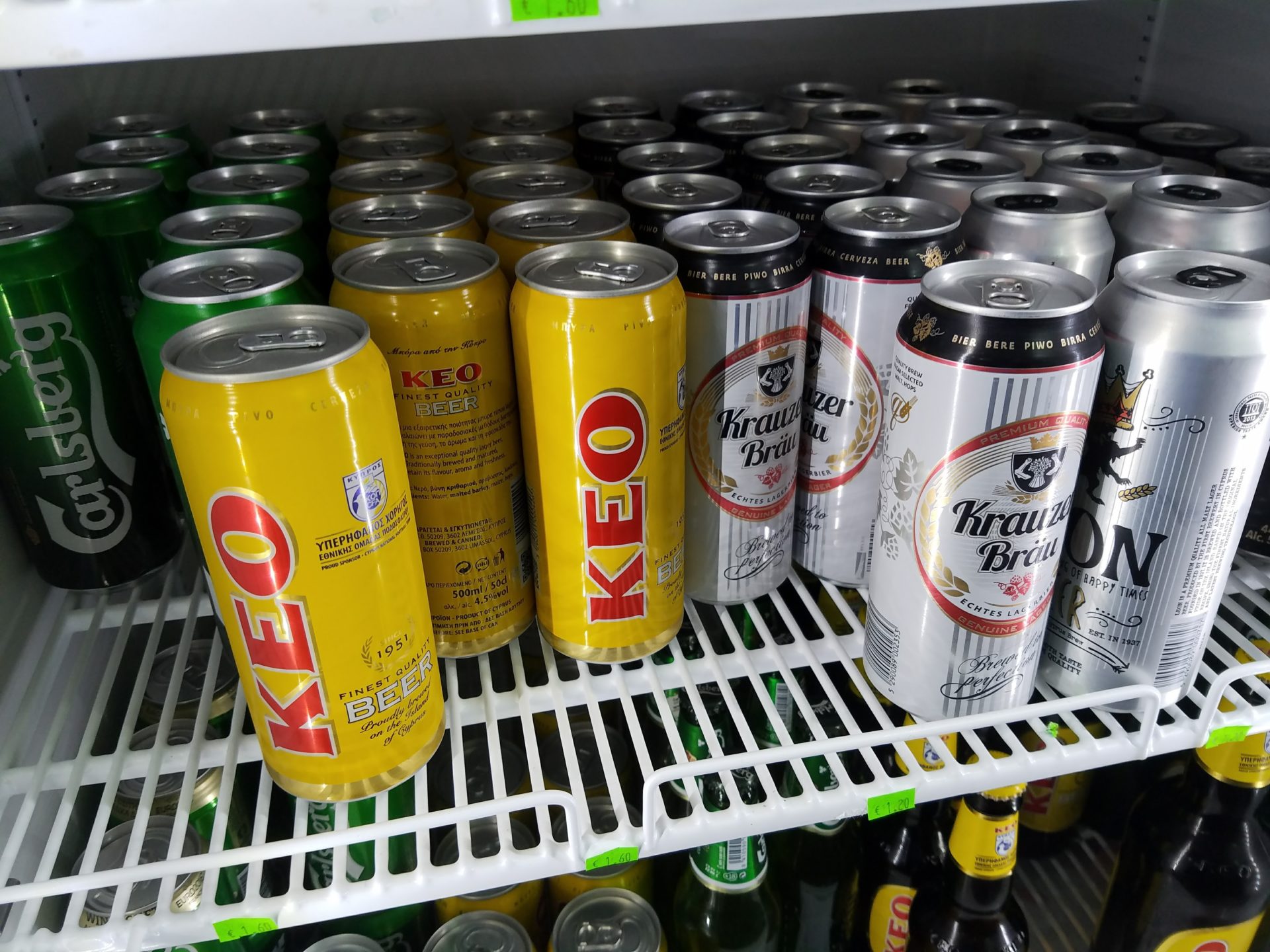a group of cans on a shelf
